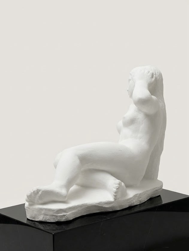 Reclining Nude, Sculpture in Plaster — side angle on black pedestal