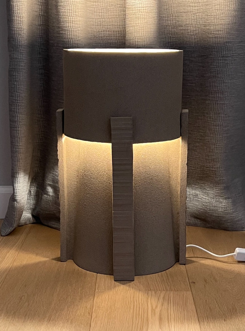 Hold ceramic table lamp with warm LED lighting and textured finish