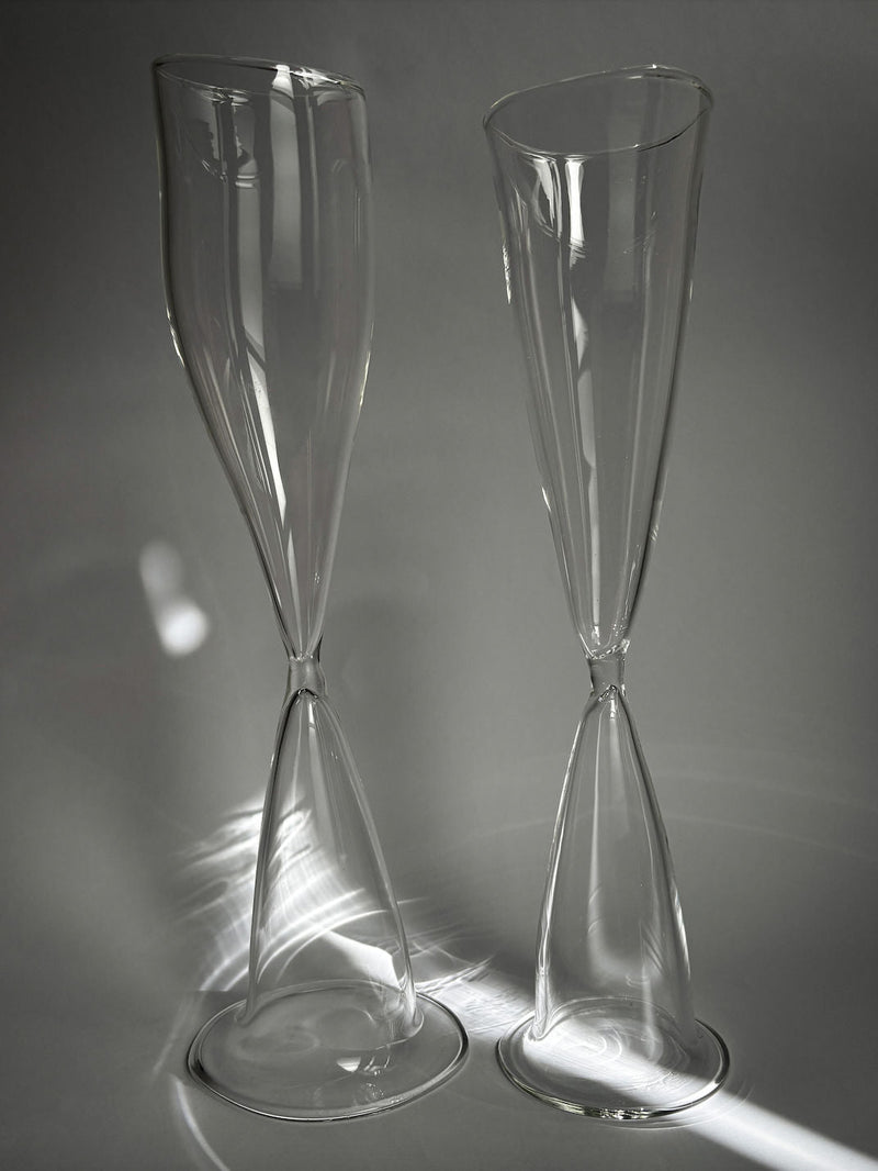 Two elegant twisted stem champagne flutes in clear crystal glass