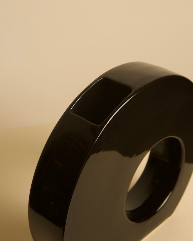 Black ceramic Vase by Sicart 80's — close-up of glossy black finish