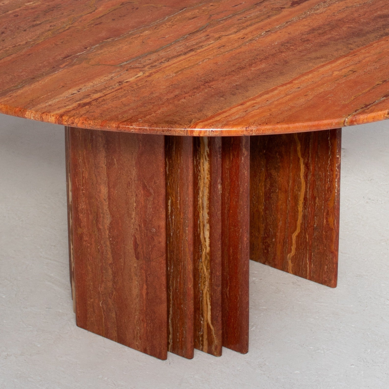 Round Dining Table in Rosso Travertino