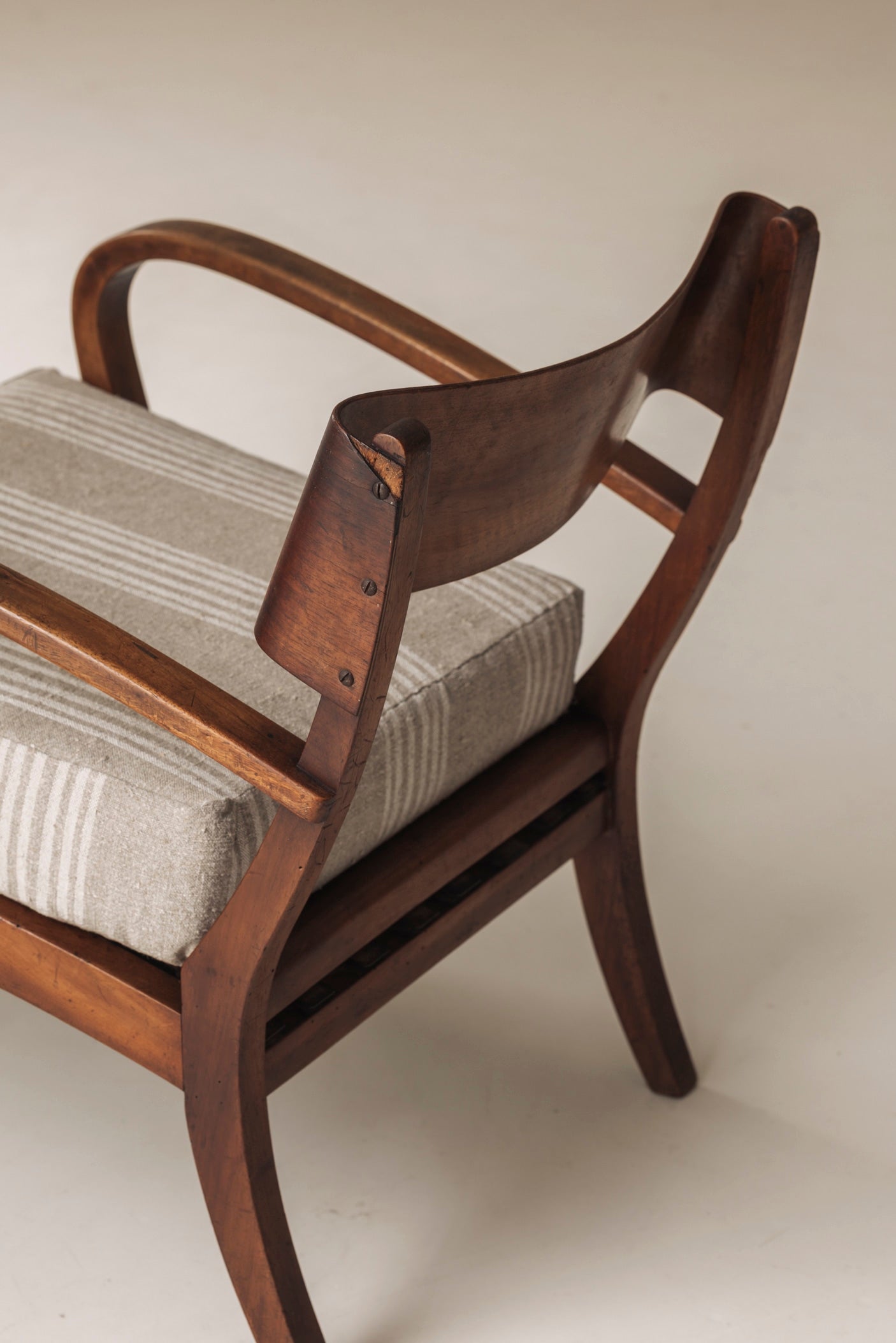 Sculptural pair of Italian easy chairs in walnut from the 1950s. — alternate view