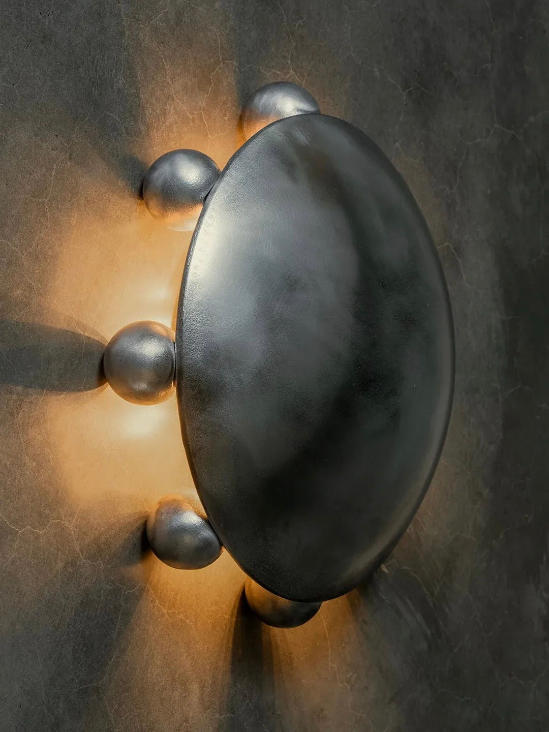 ALTER Sconce | Aluminium — side view highlighting rounded metal design