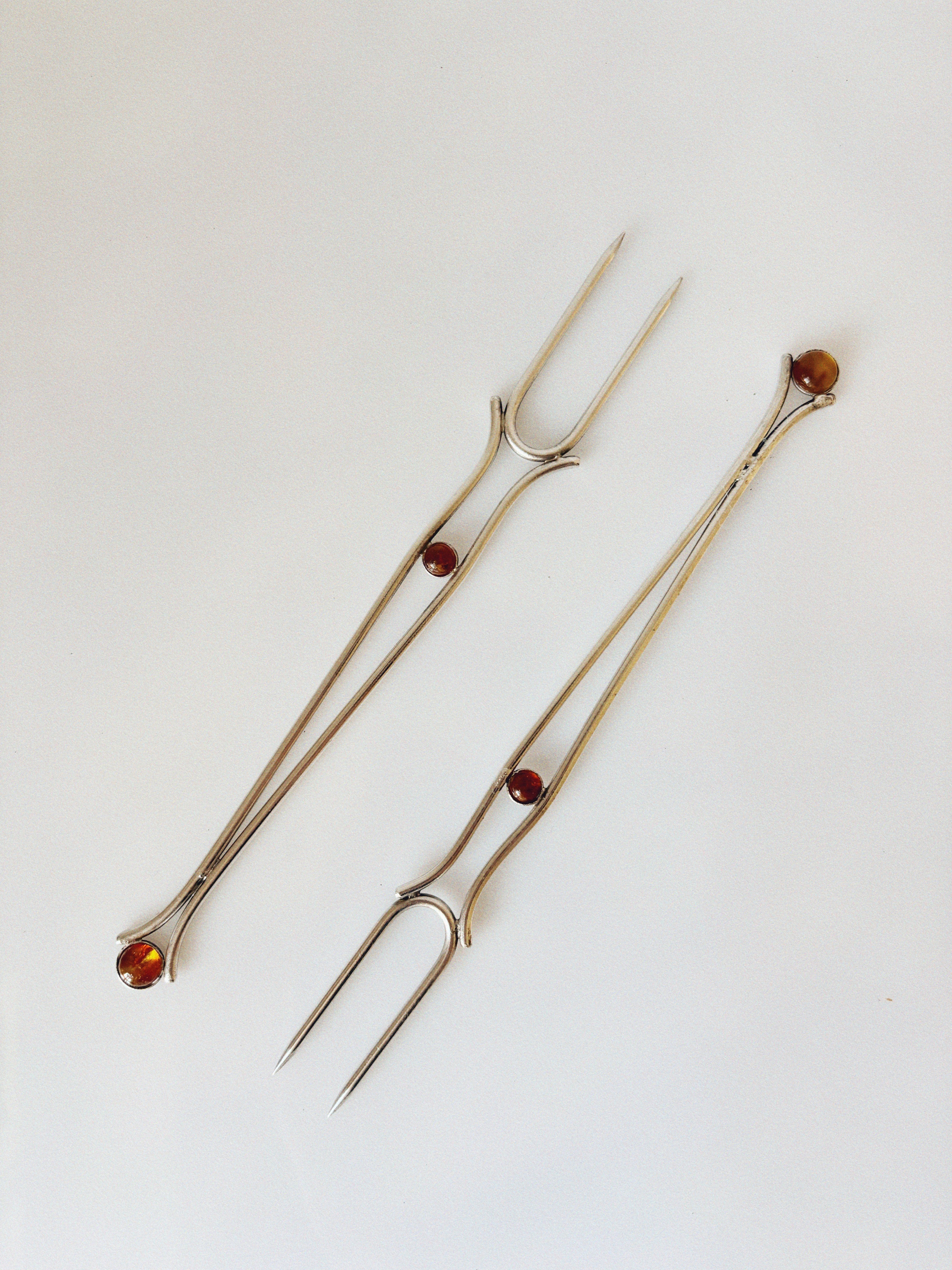 Silver Plated Serving Forks With Amber Inlay, Poland — close-up of amber inlay details