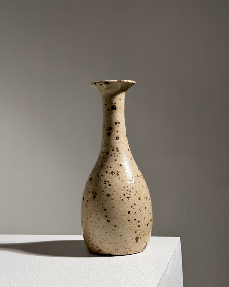 Cream stoneware soliflore vase with speckled brown glaze finish