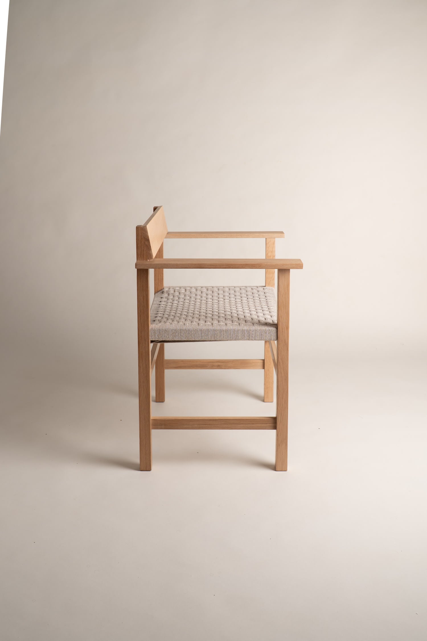 "Cadira.03" Hand woven oak chair — lifestyle setting
