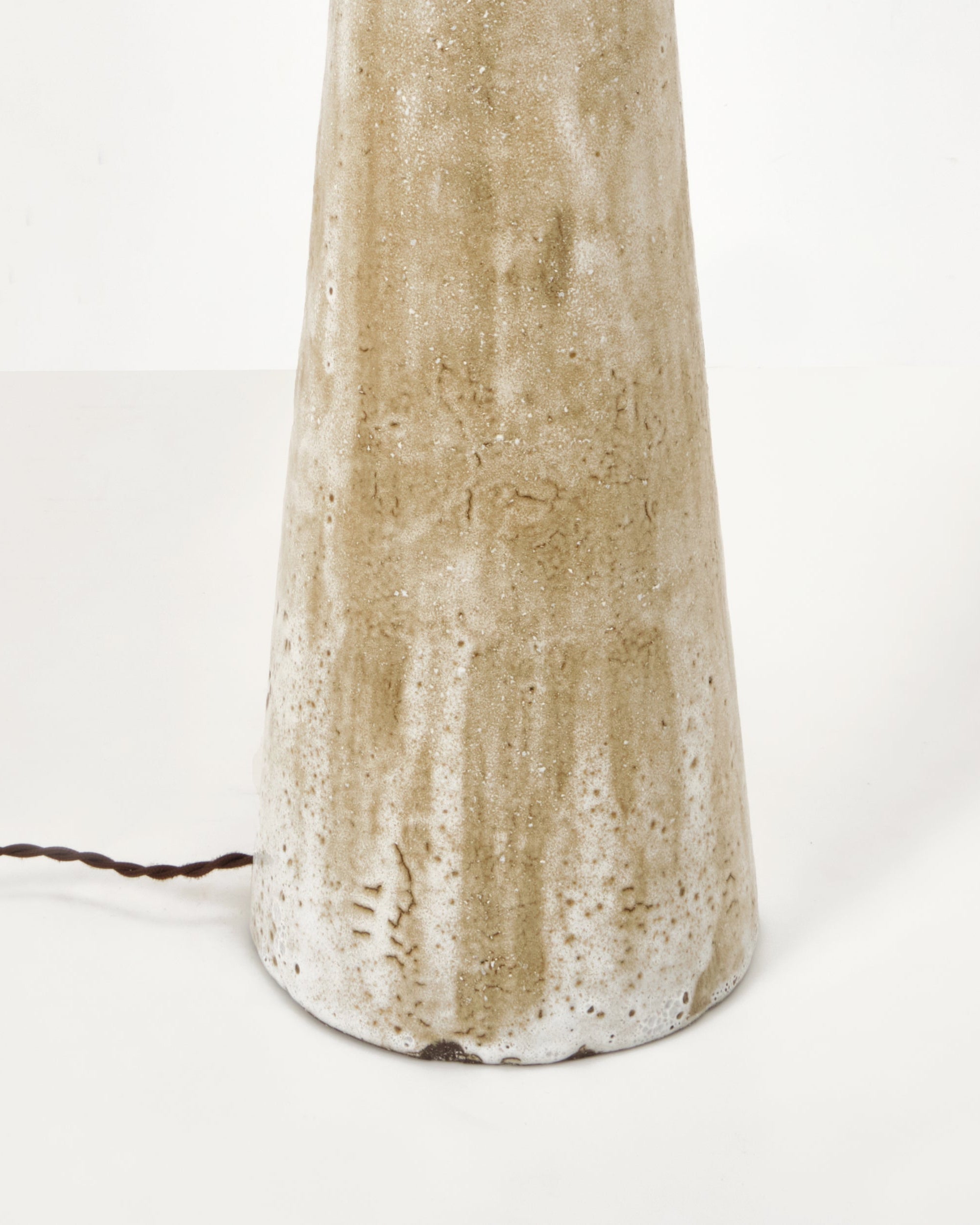 Quinta Floor Light No2 — back view of textured ceramic base
