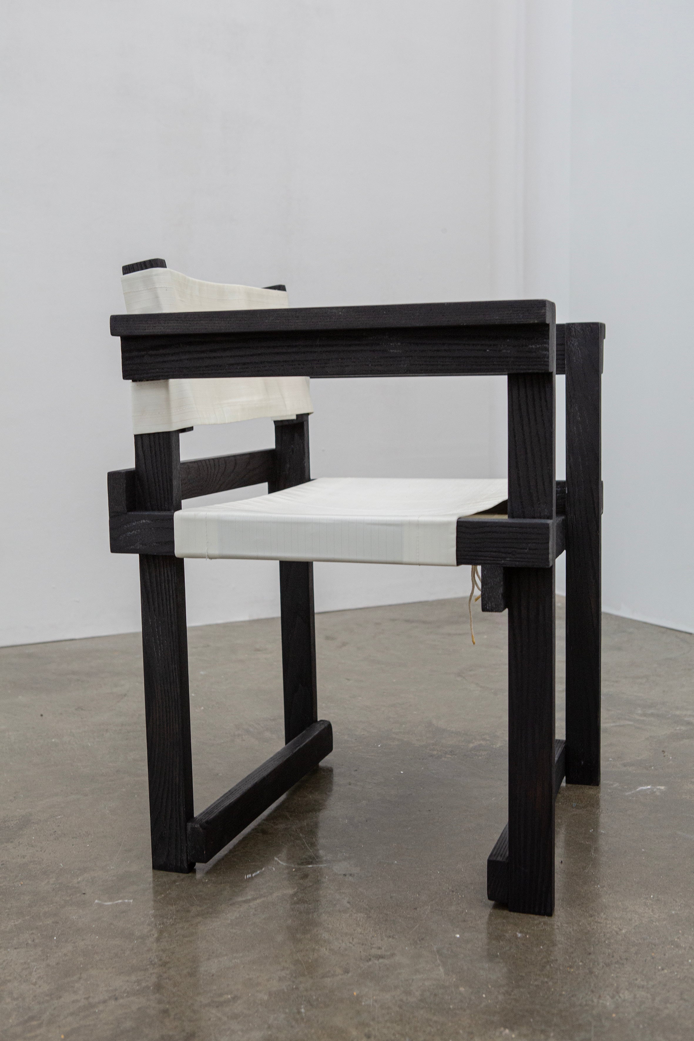 Modernist Dutch Chair after Gerrit Rietveld (1-6) — side view highlighting black wooden frame