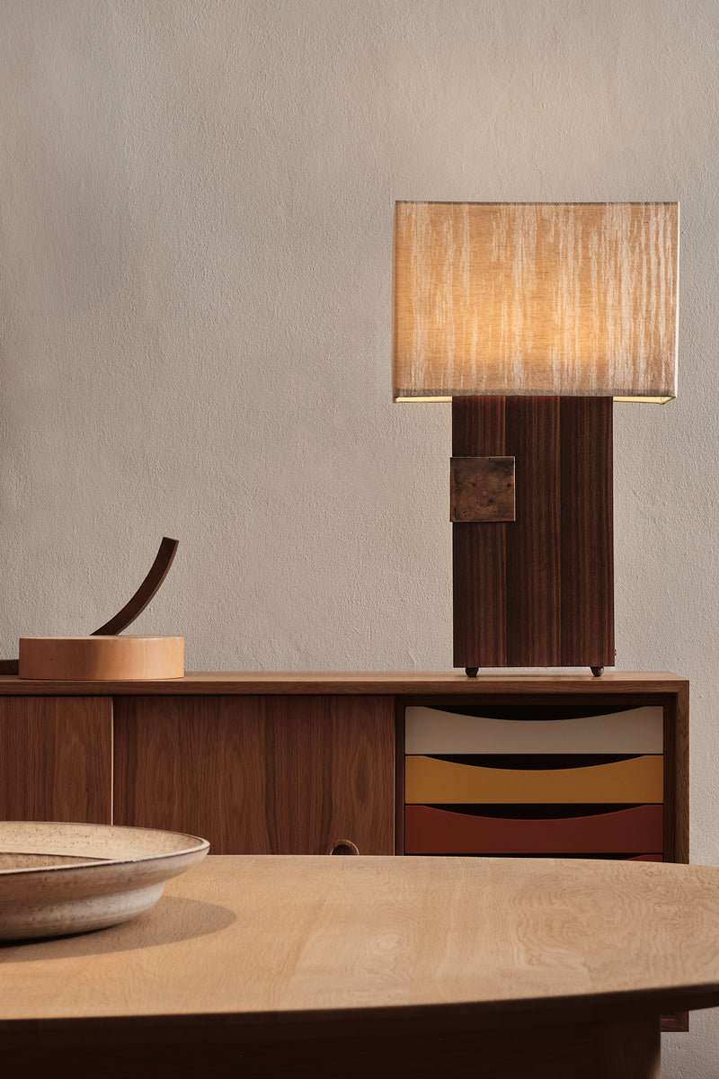 Esperia table lamp with walnut base and cream fabric shade