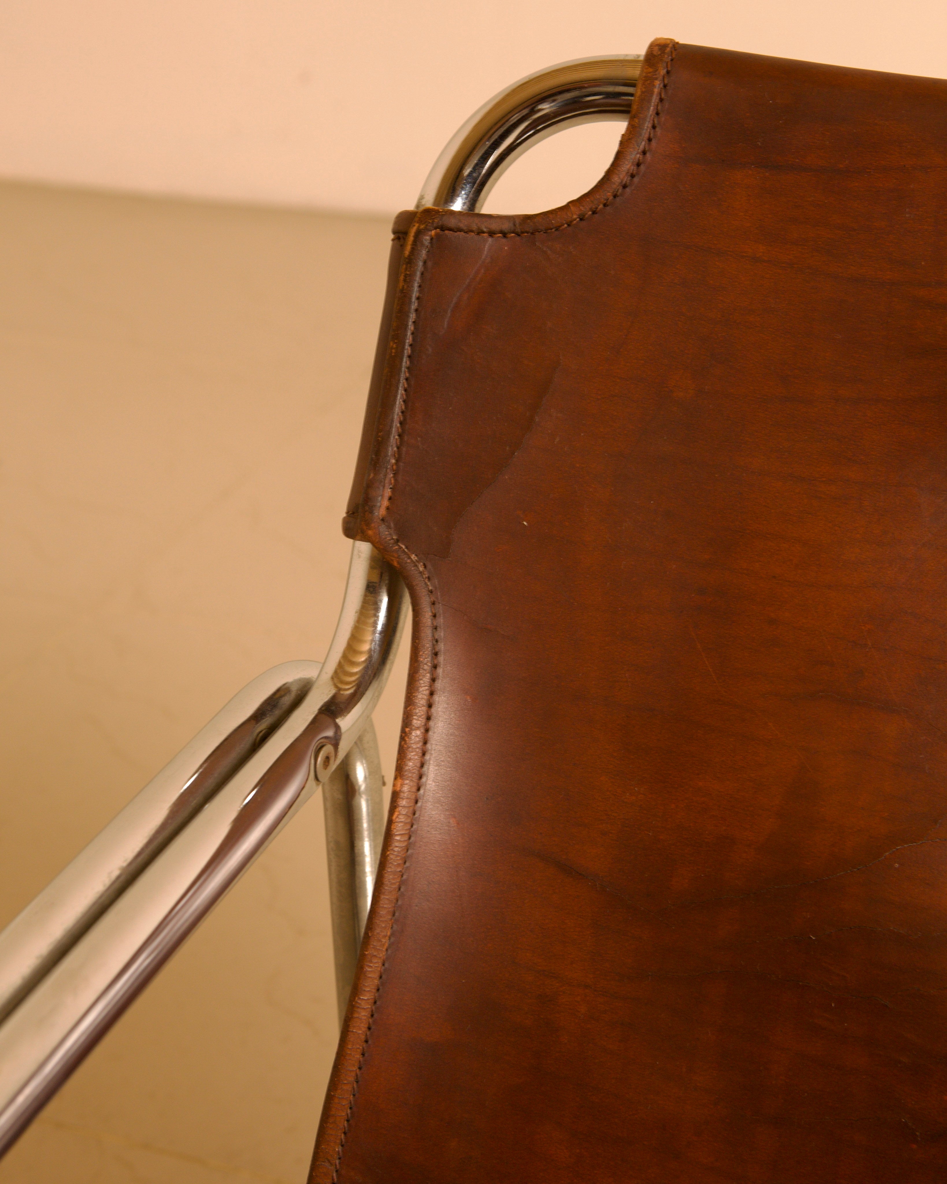 Chrome-plated steel and leather armchair by Antonello Mosca for Produzione Forma, 70s — in context