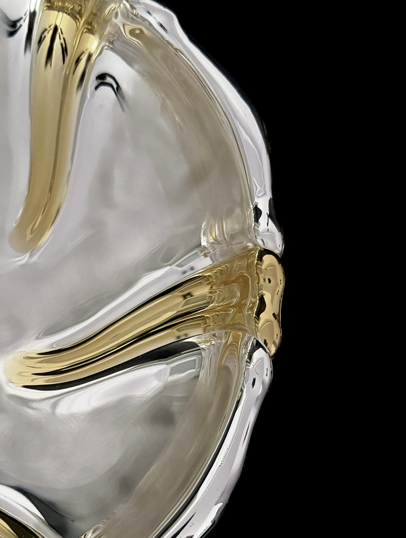 Vintage Dish in Metal — close-up of shiny gold and silver details