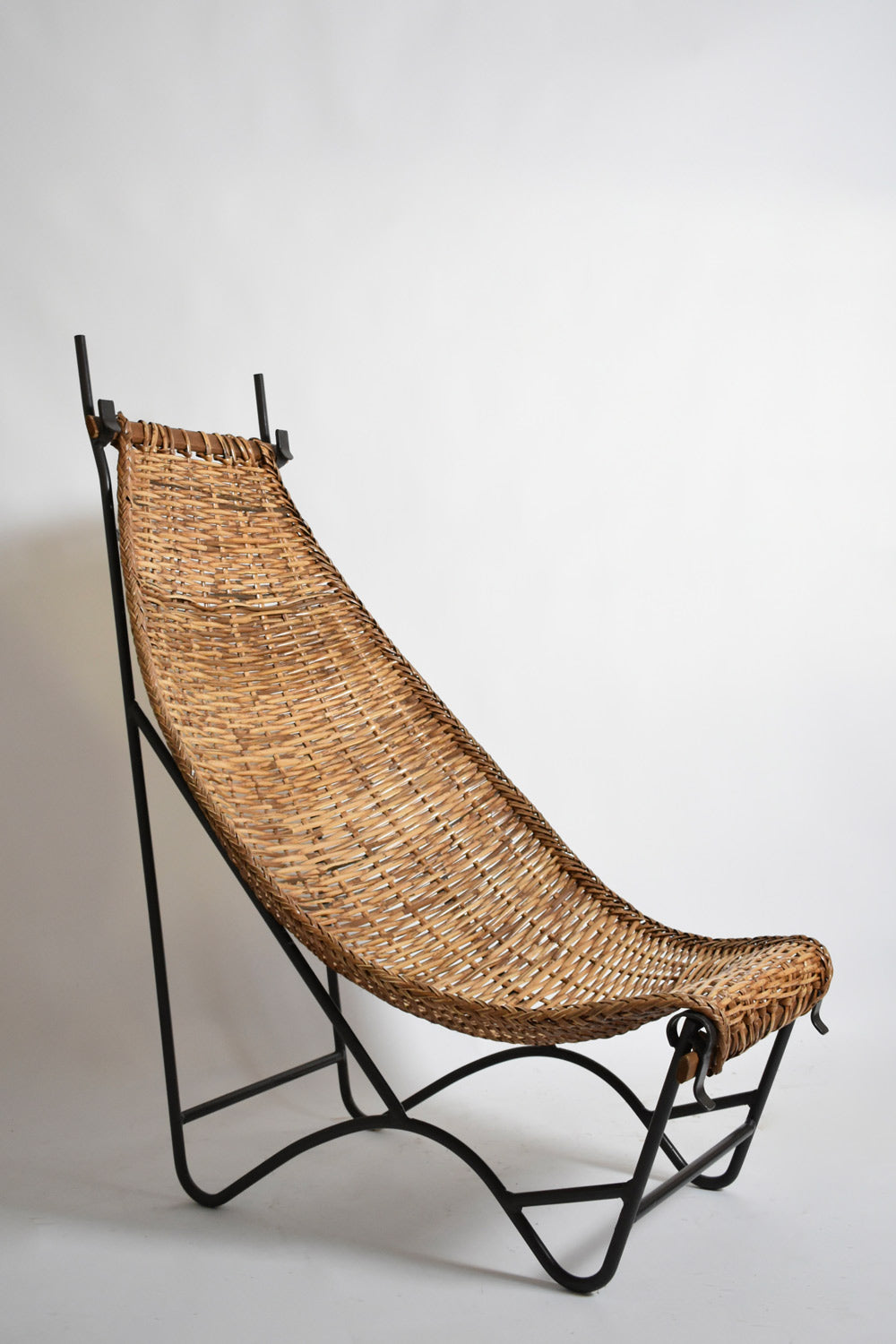 Wrought iron and rattan armchair, 1950s — detail view