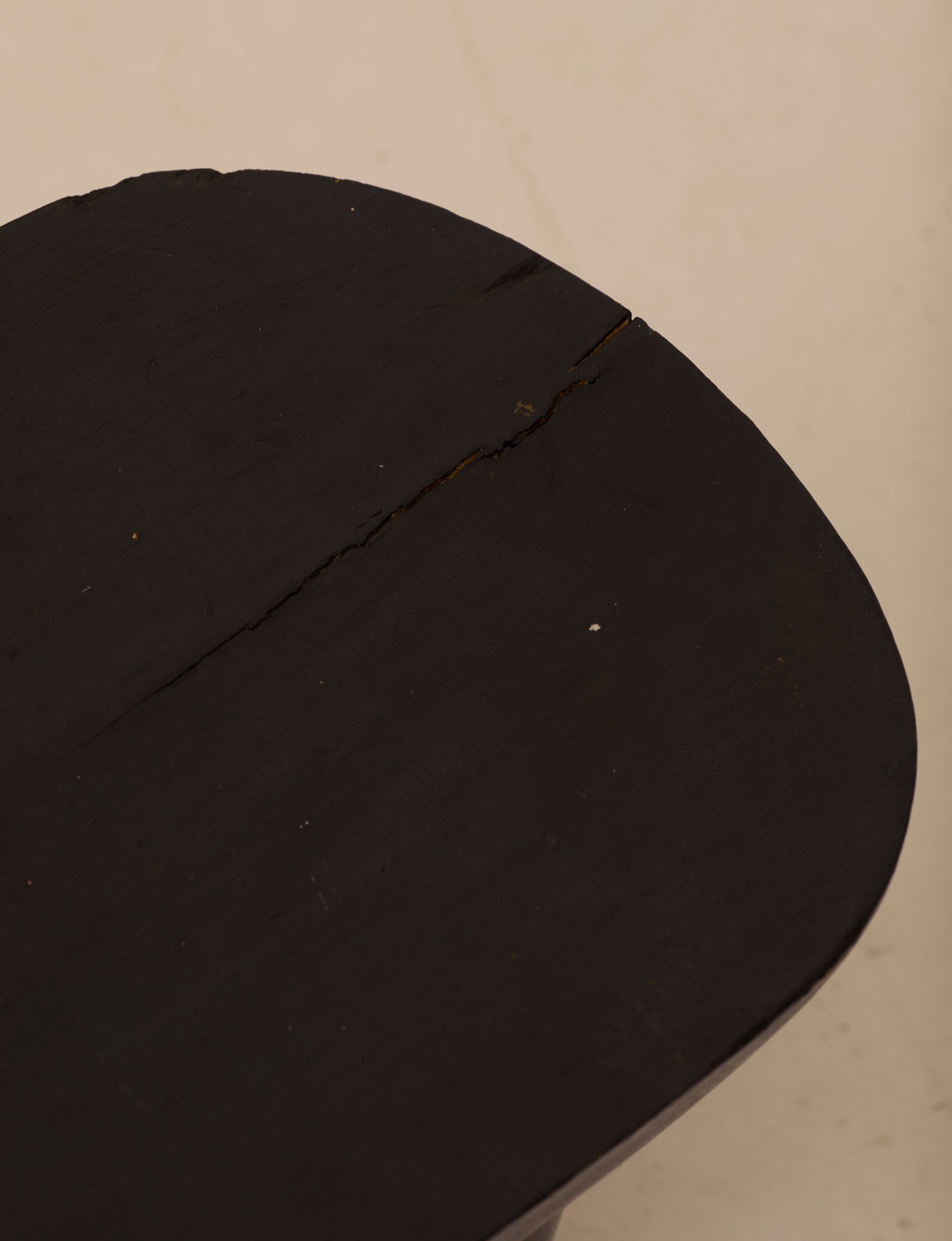 Vintage Senufo Monoxyl African Stool in Black / Wenge — top view showing wood grain and crack detail
