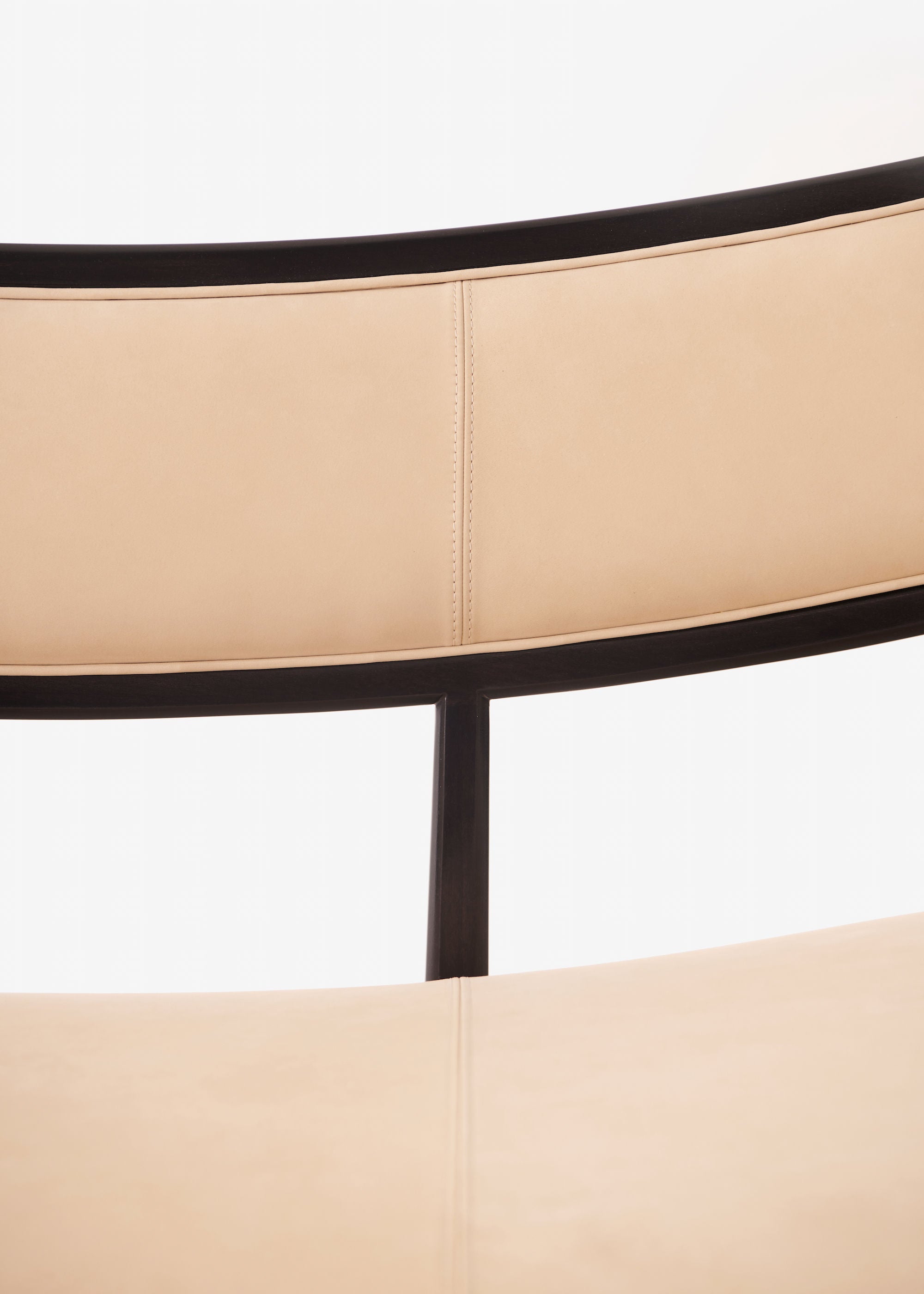 Daybed Sofa — back view highlighting soft beige upholstery