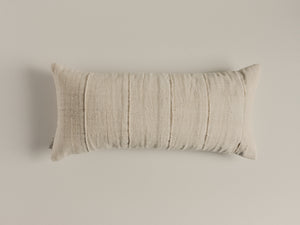 Handwoven white textured cushion — side angle