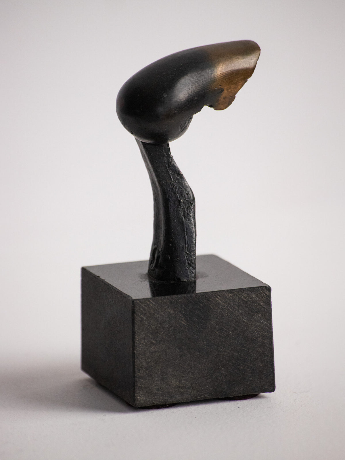 Biomorphic Sculpture in Patinated Metal on a Black Stone Cube, Scandinavian, Late 20th Century — additional view