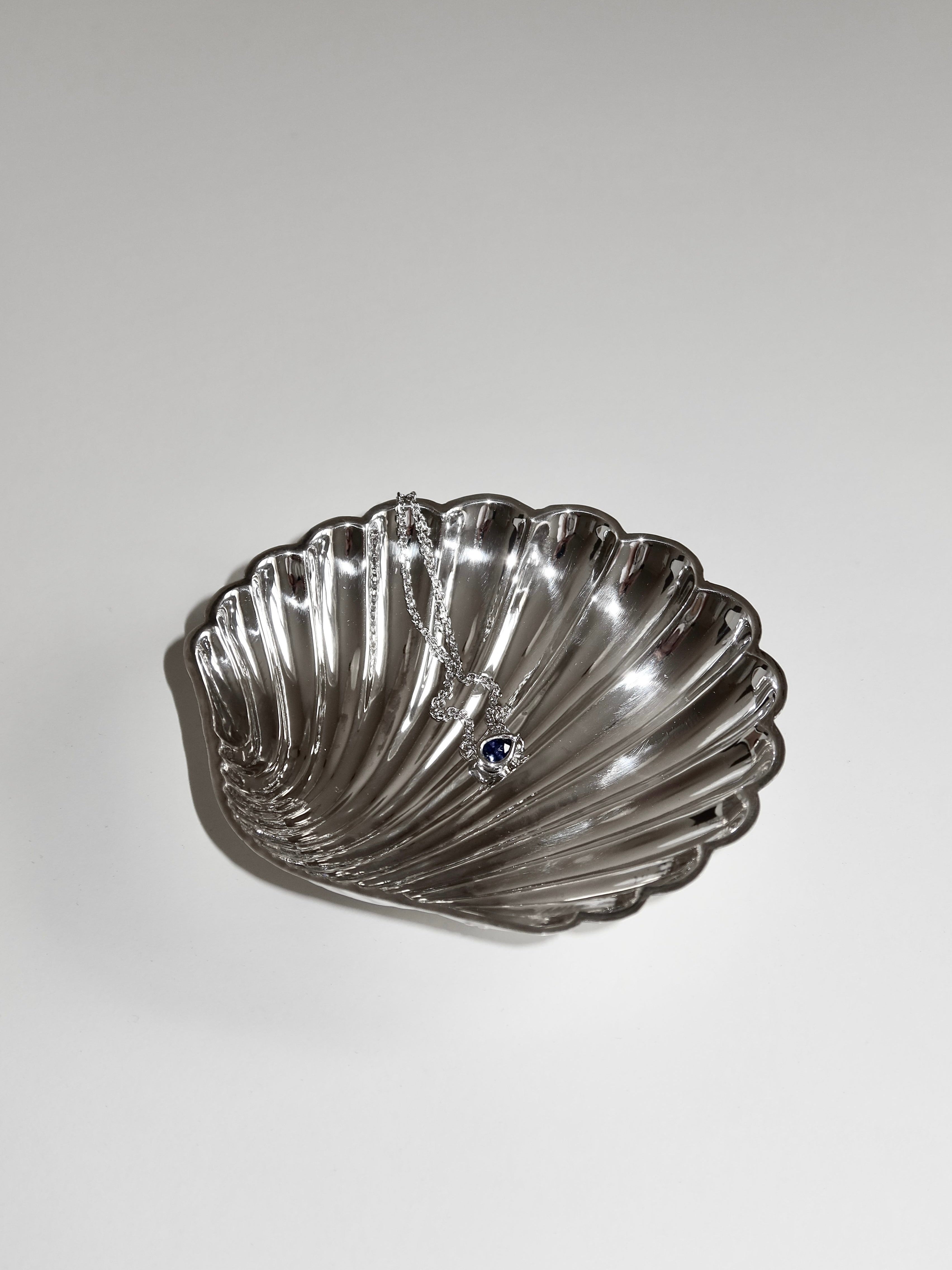 Sterling Silver Shell Vide-Poches — side angle showing shiny silver interior