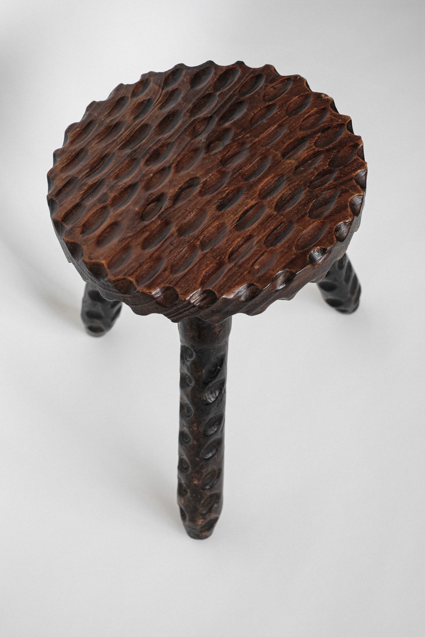 Hand-carved Wooden Tripod Stool — side angle