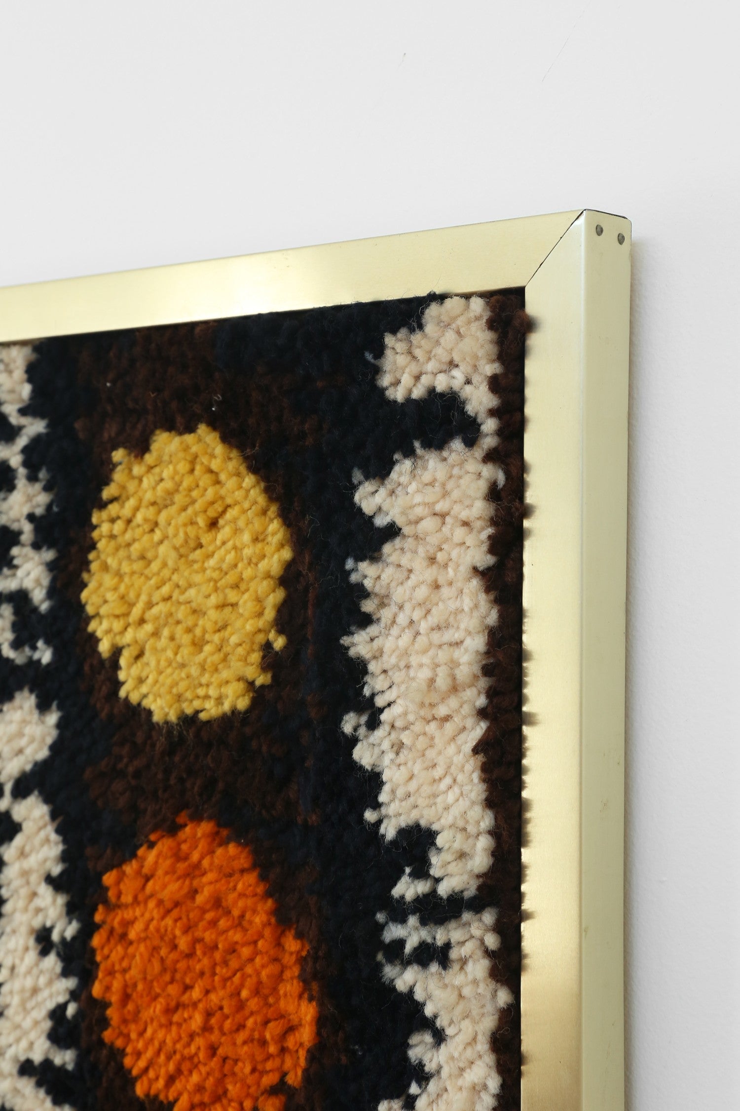 Scandinavian Textile Framed Art — close-up of textured wool in gold frame