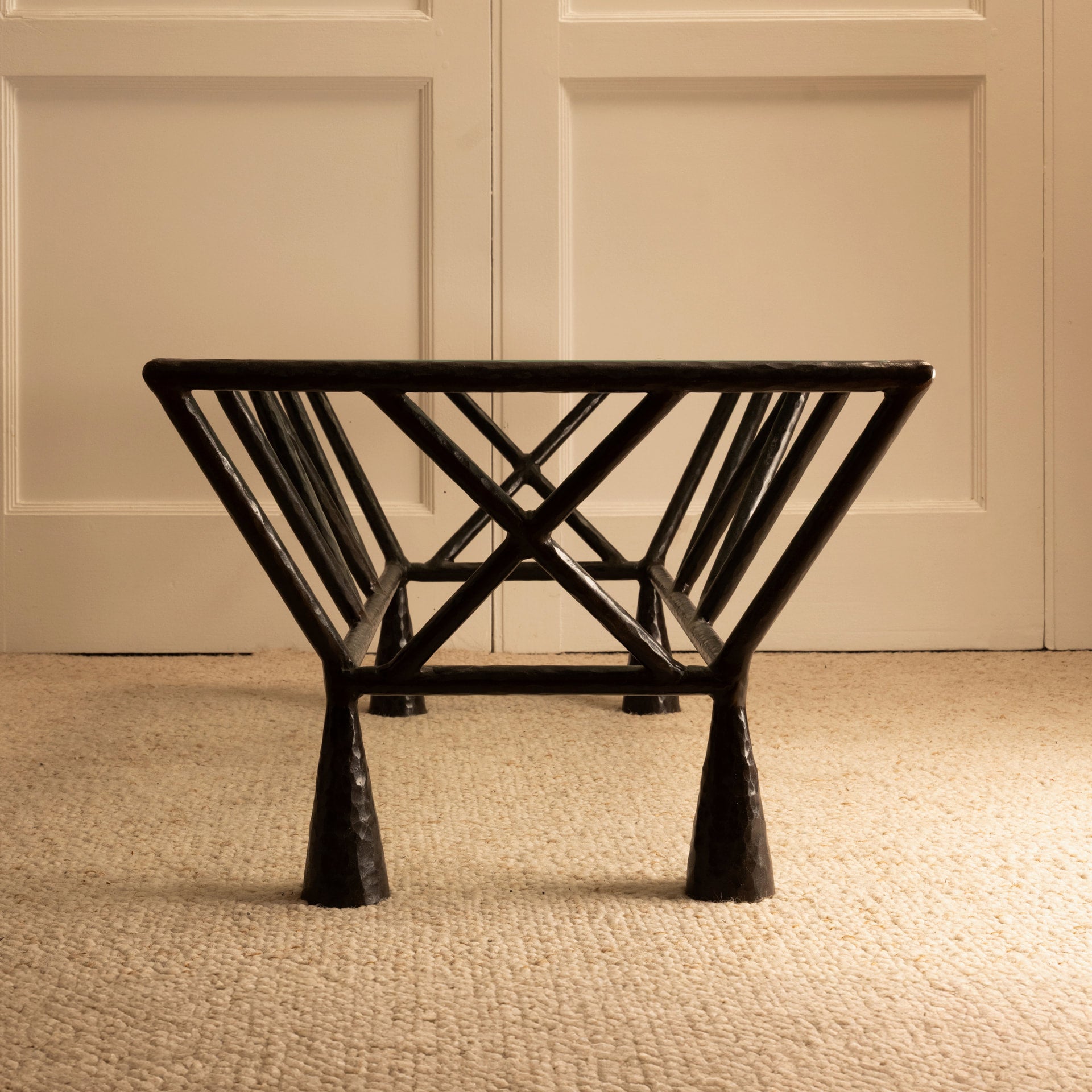 Zebra Coffee Table — front view of textured black metal legs