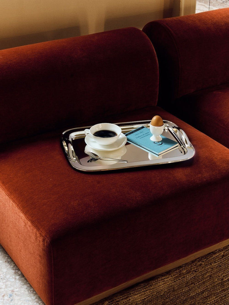 Silver Serving Tray with Handles — top view on red velvet sofa