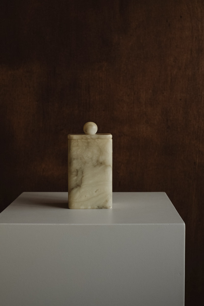 Vintage Onyx Jar — close-up of onyx texture against dark background