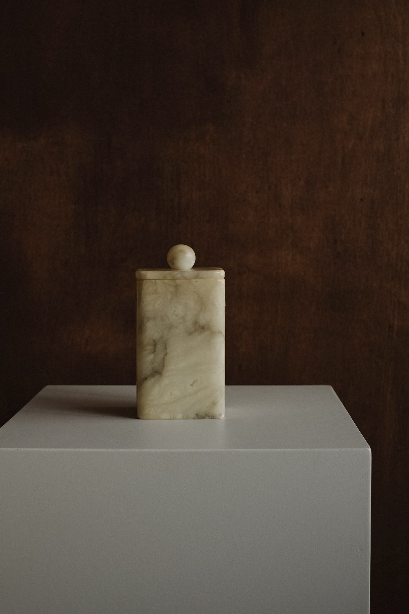 Vintage Onyx Jar — close-up of onyx texture against dark background