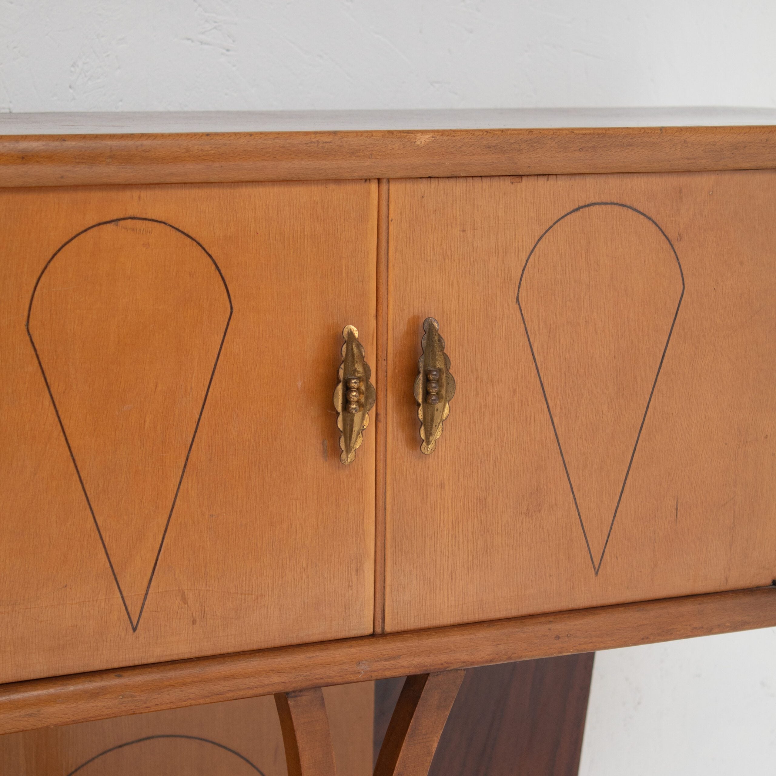 Art Deco Walnut Console with Inlay Details — side angle showing inlay details and brass handles