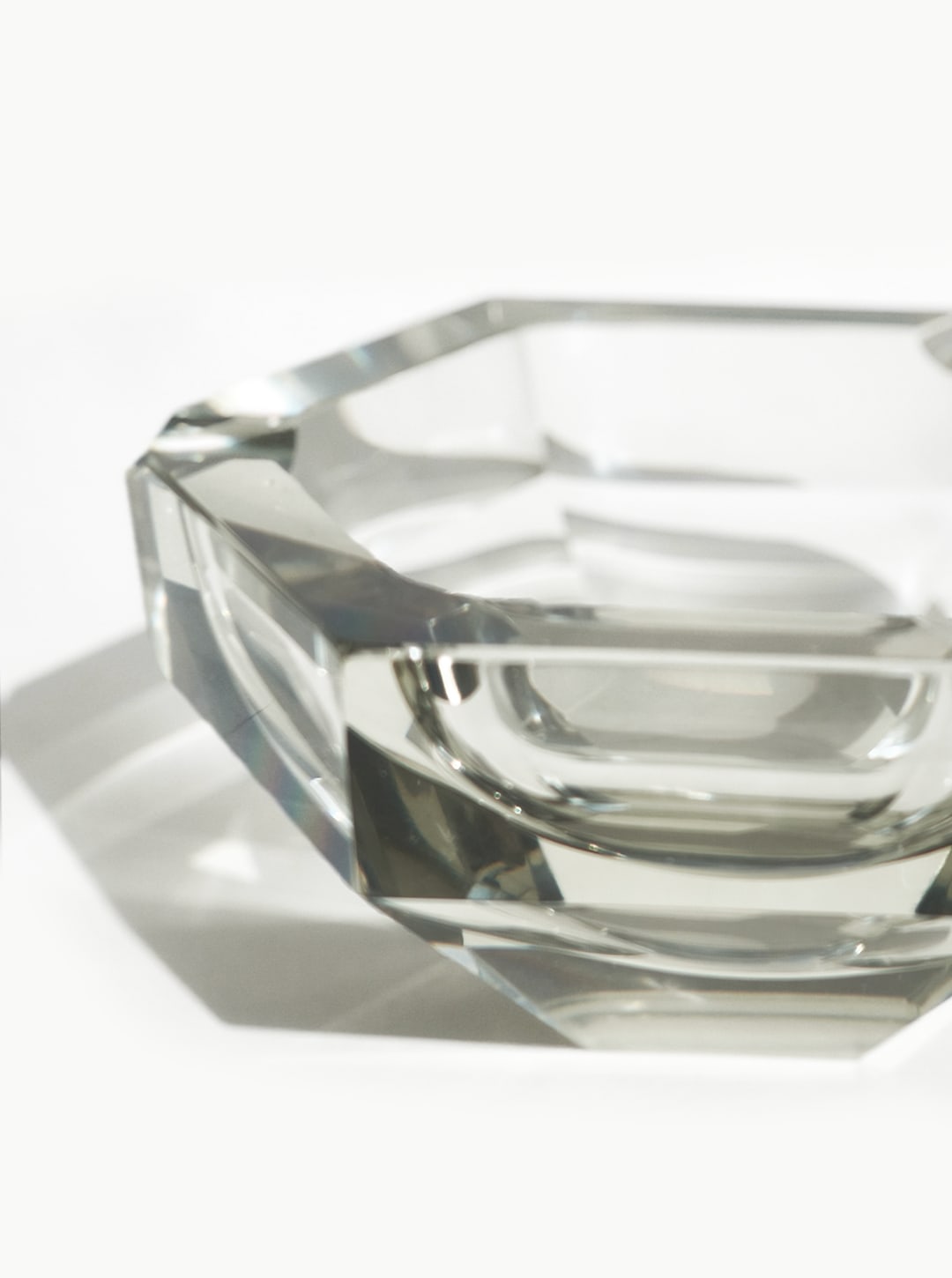 Faceted Crystal Ashtray — side angle showing clear glass material