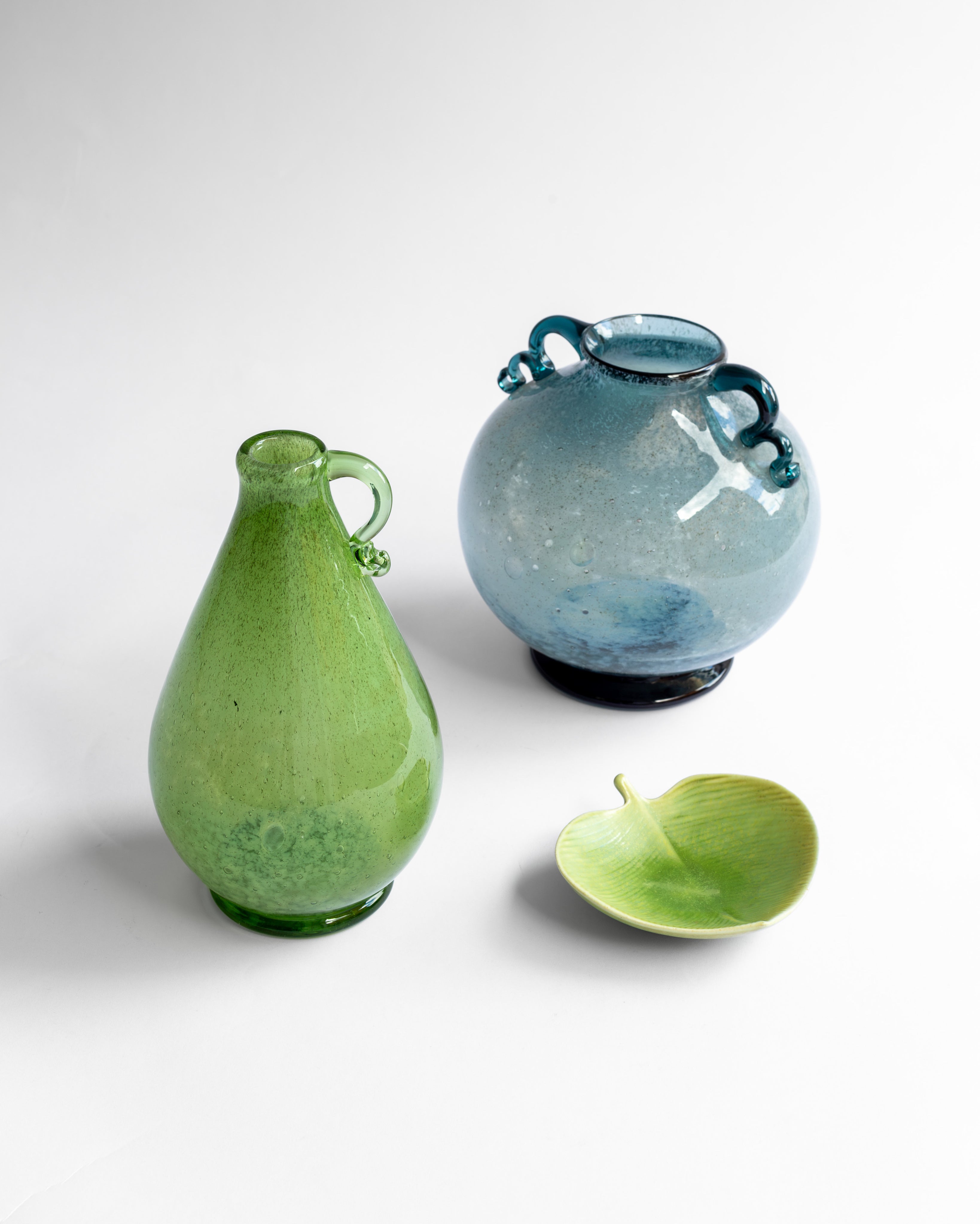 Art Deco Green Glass Vase by William Stenberg, Sweden, 1930s — lifestyle setting