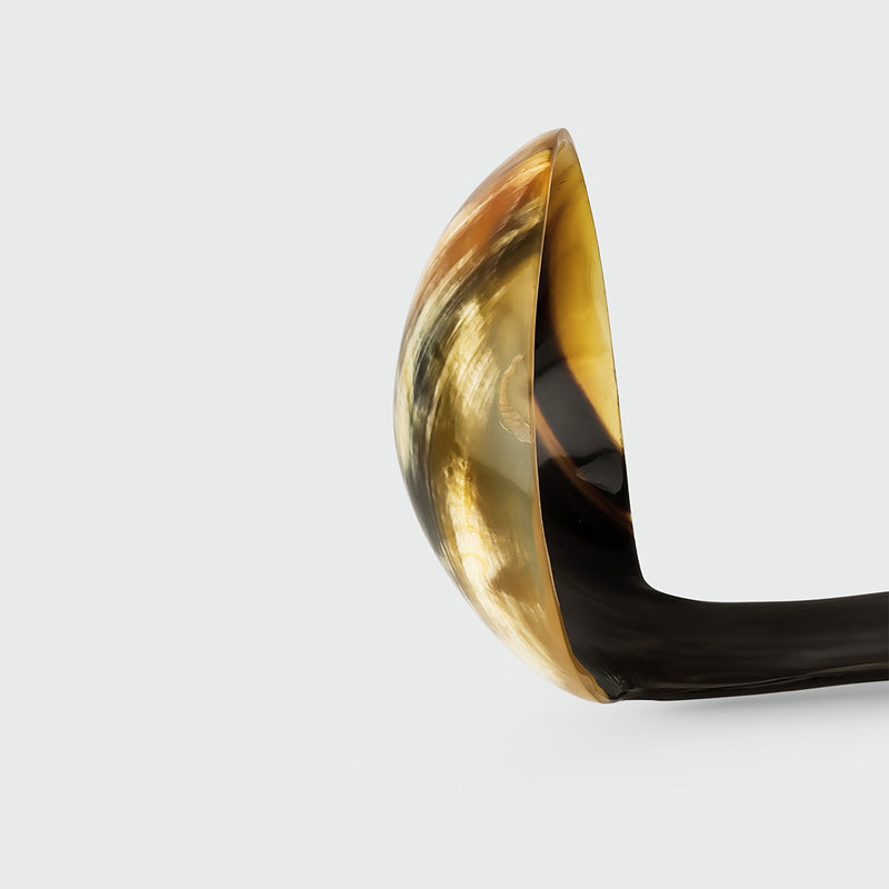 Ossu Ladle — close-up of horn material with curved handle