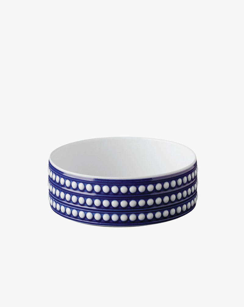 Perlée Deep Bowl — close-up of blue and white ceramic with textured rim