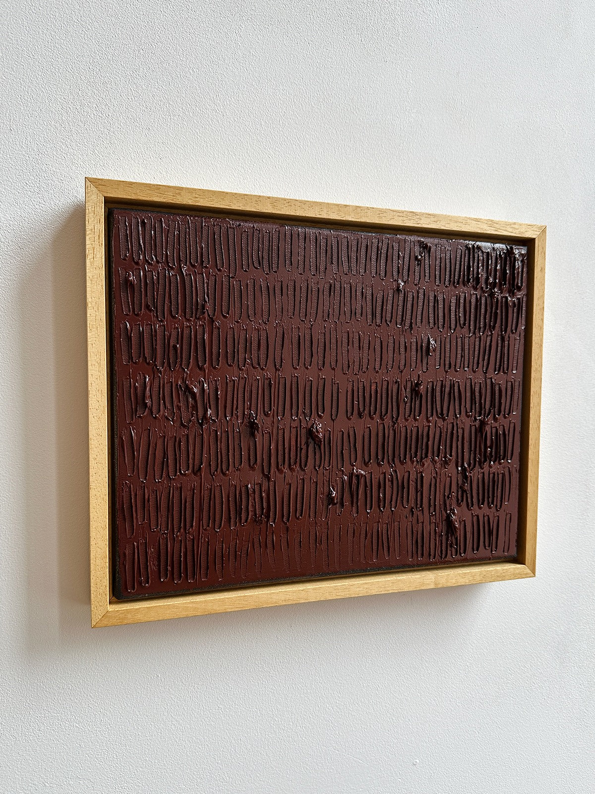 Indian Wine - Turf Series' Painting — close-up of textured brown surface in wooden frame