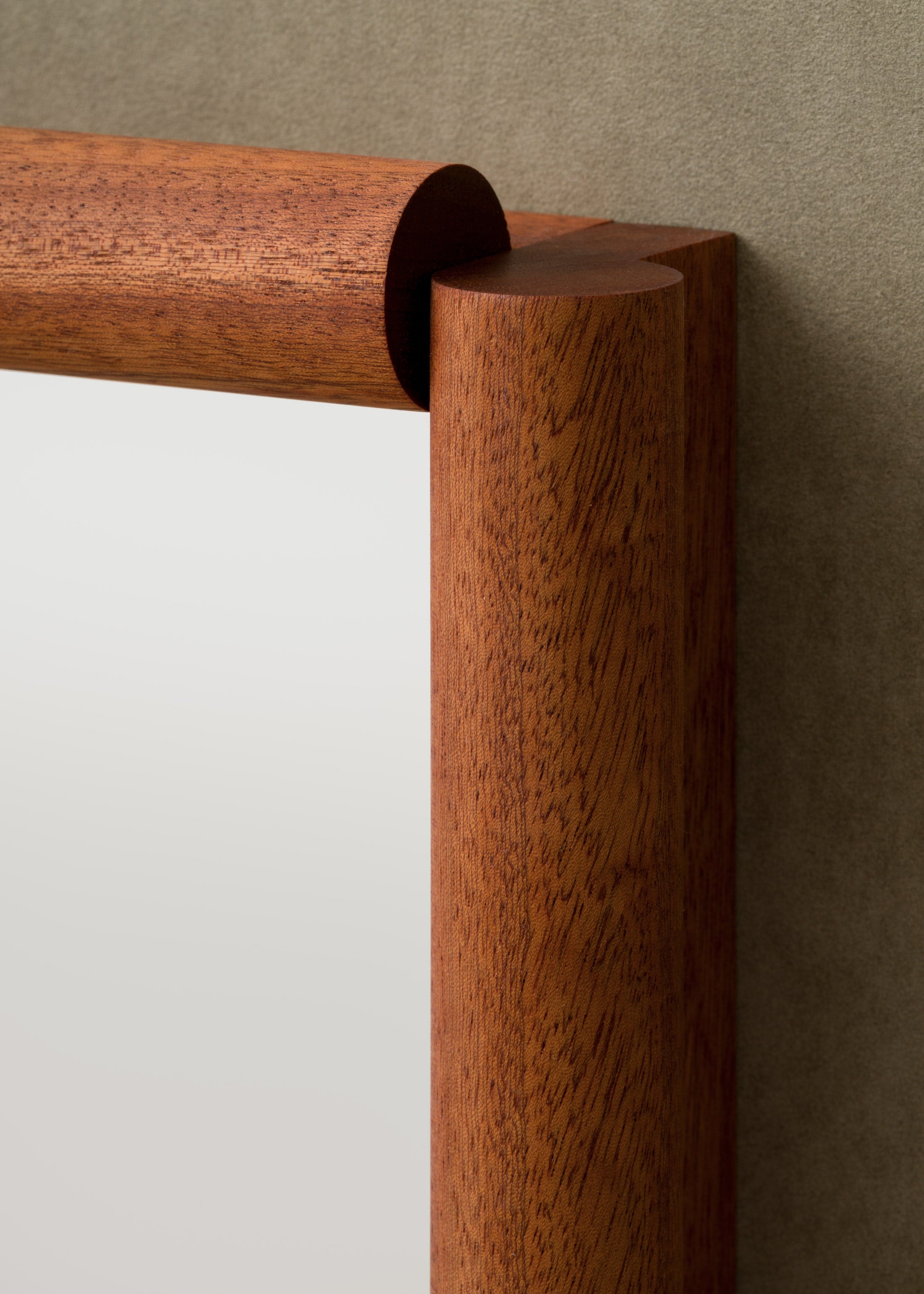 bahraini–danish Mirror in Pear or Mahogany Wood — lifestyle setting