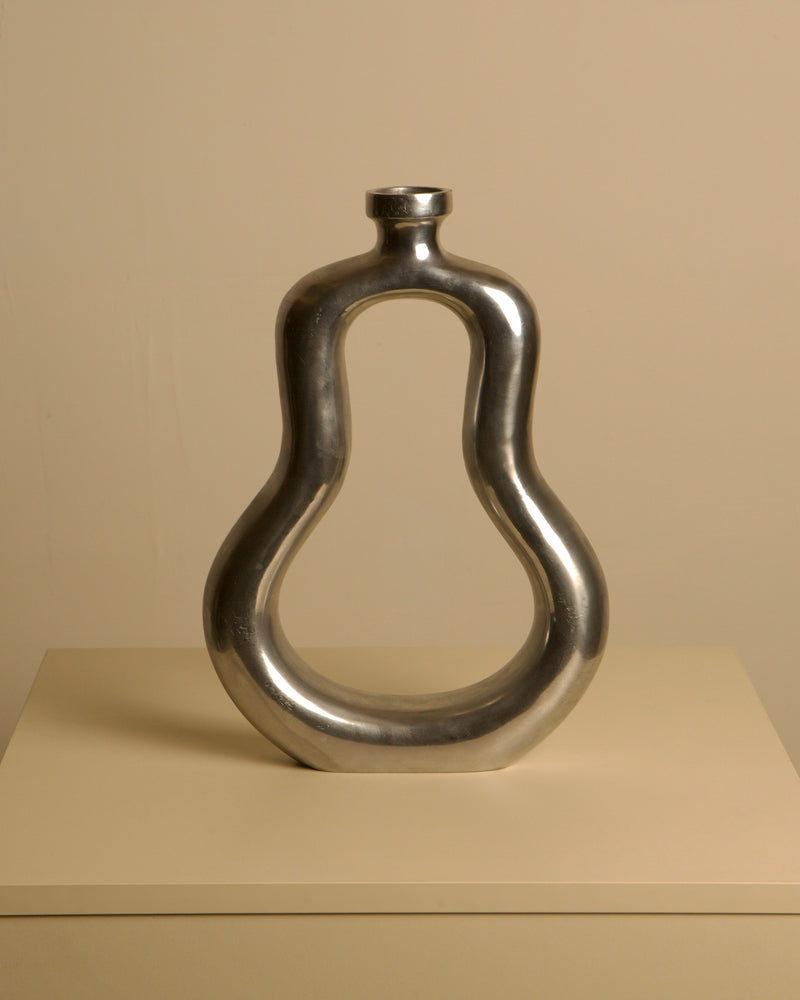Italian cast aluminum vase 80's — front view highlighting smooth metallic finish