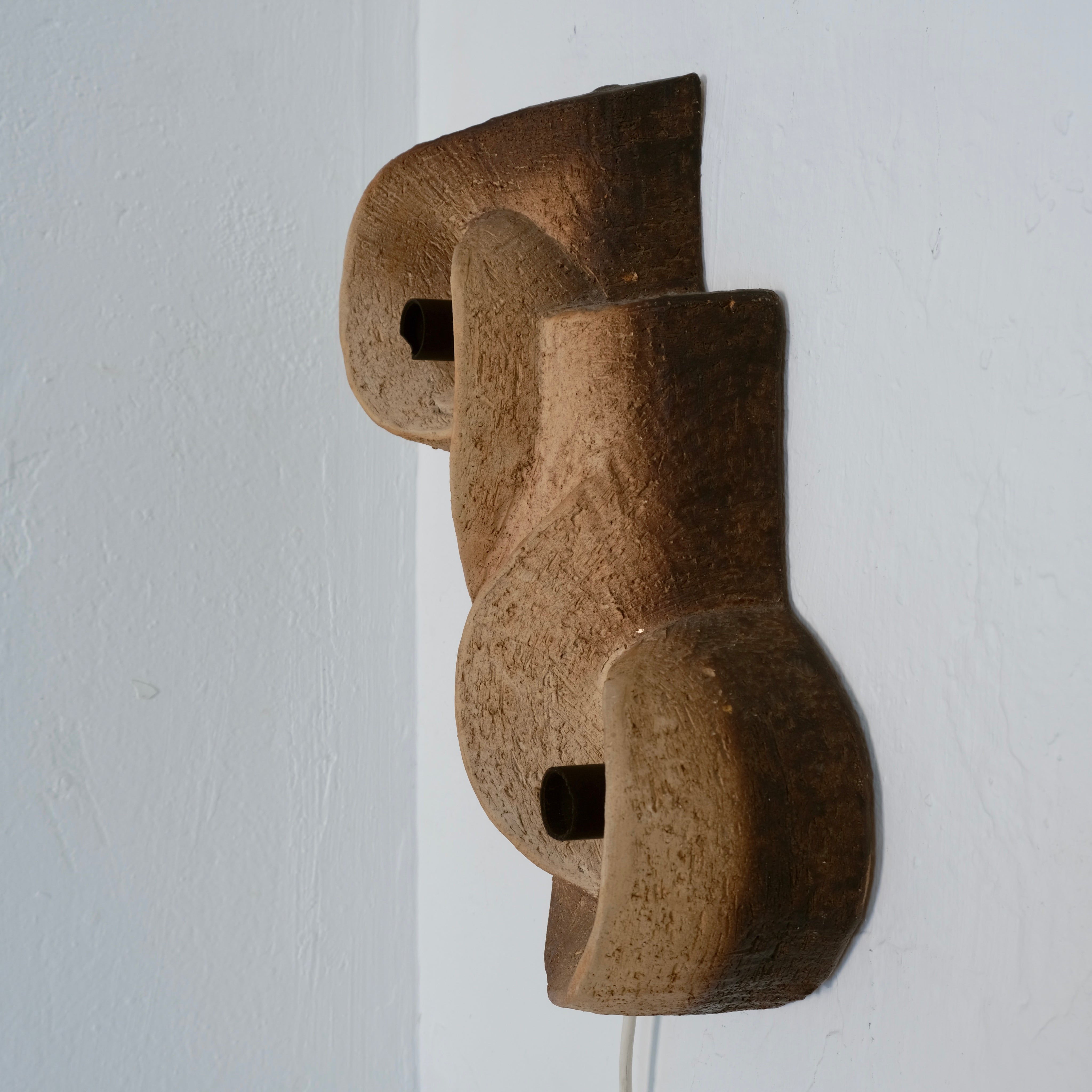Brutalist Ceramic Wall Sconce, Netherlands, 1960s — angled view against white wall
