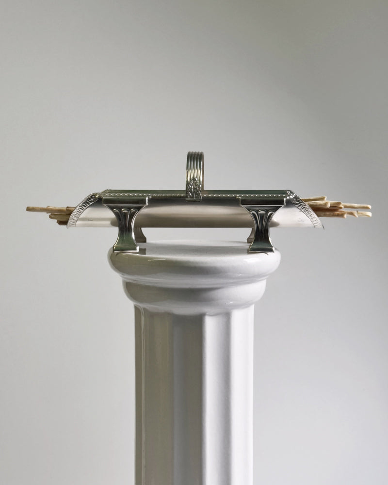 Italian Empire Art Deco grissini holder on white column pedestal