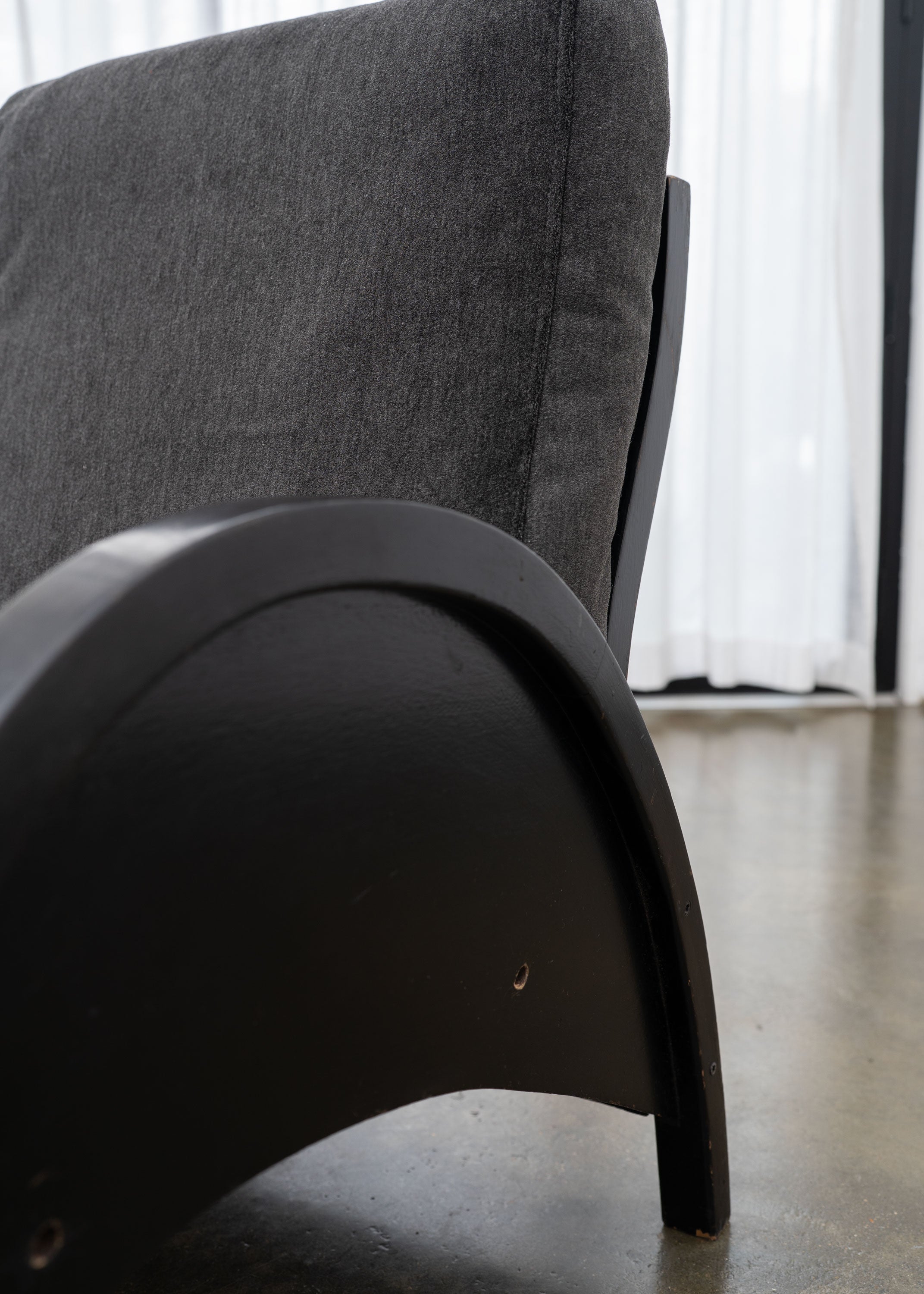 Modernist Armchairs, c.1950 — side view of black wooden armrest