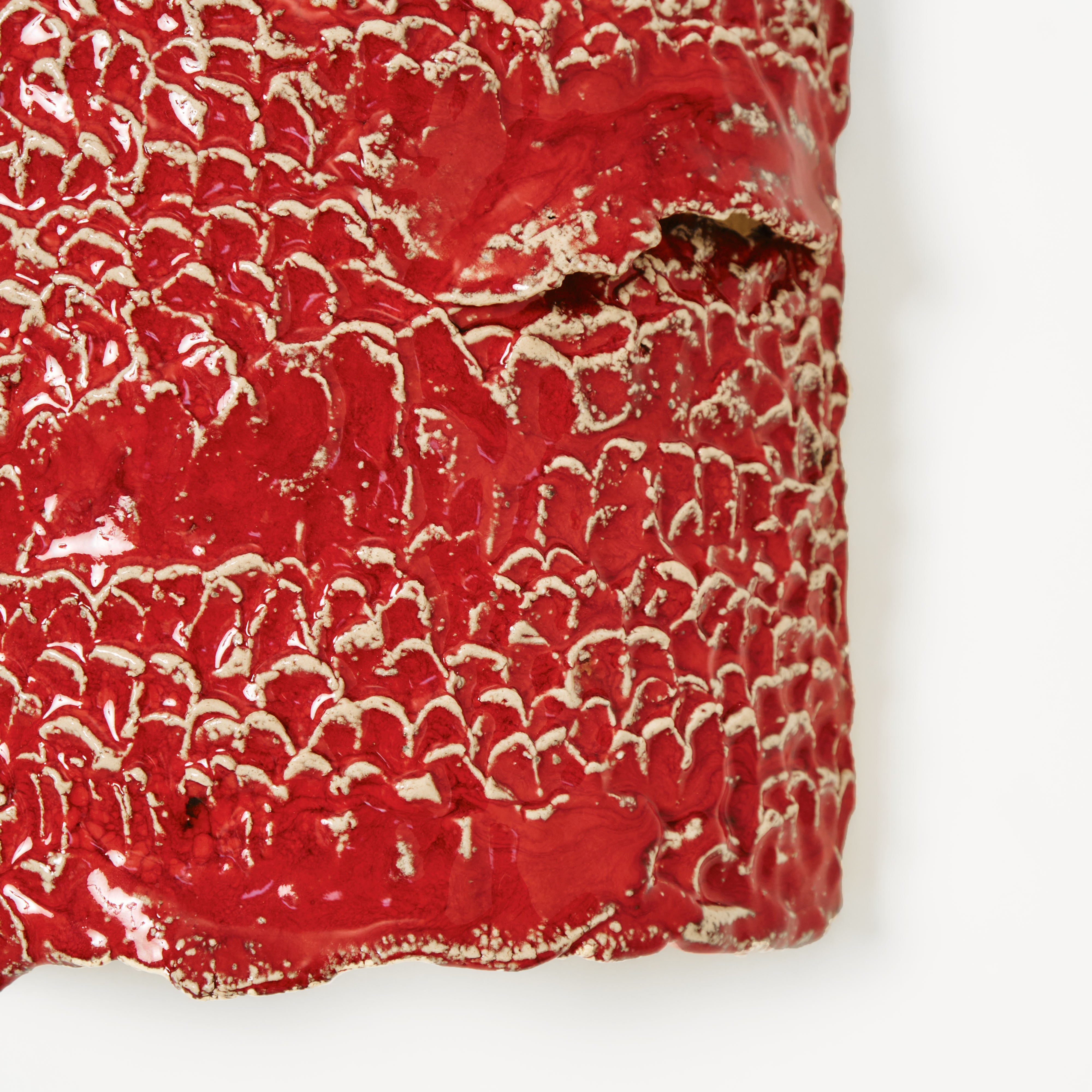 Casa Wall Light No3 — close-up of textured red ceramic surface