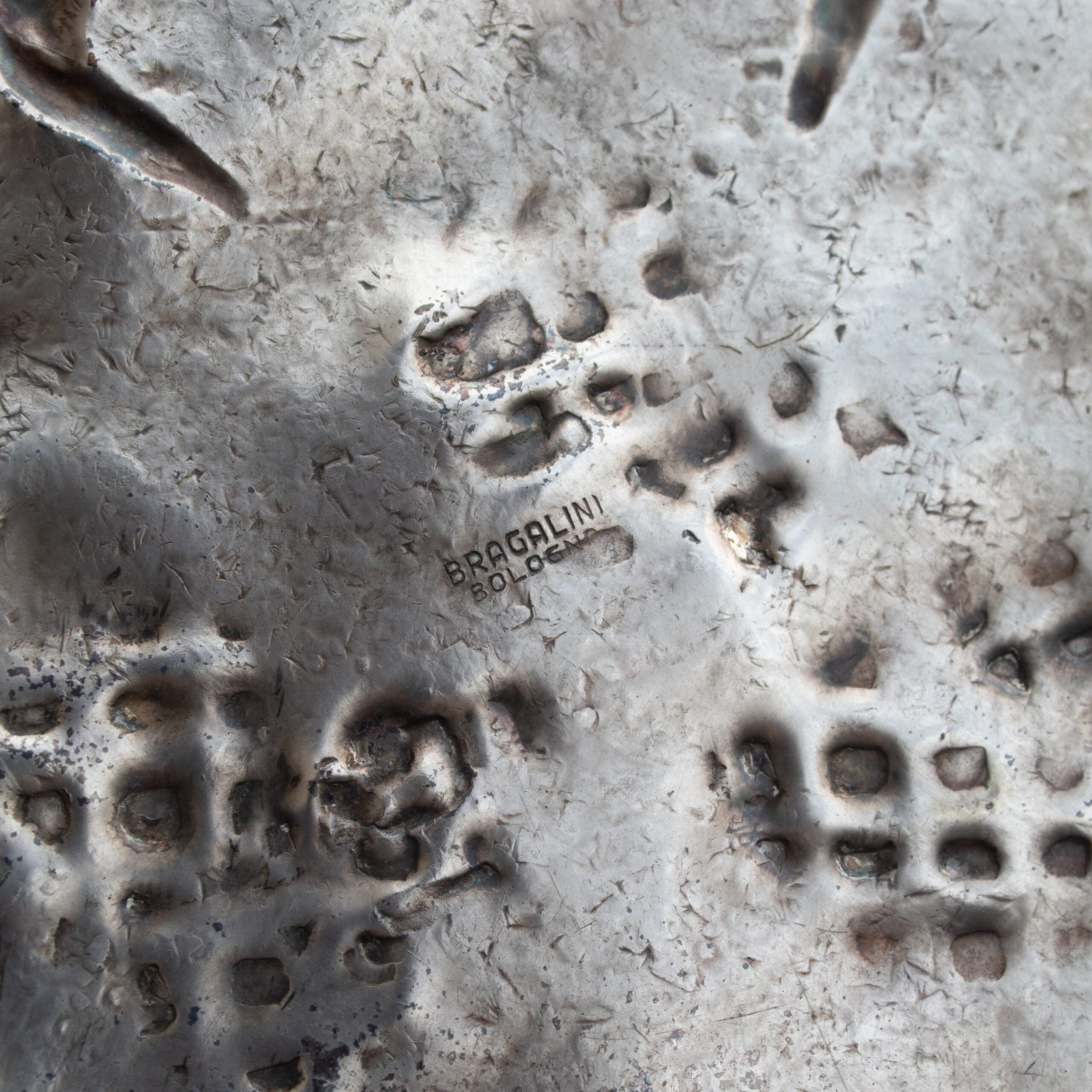 Bragalini Hammered Metal Wall Sculpture — in context