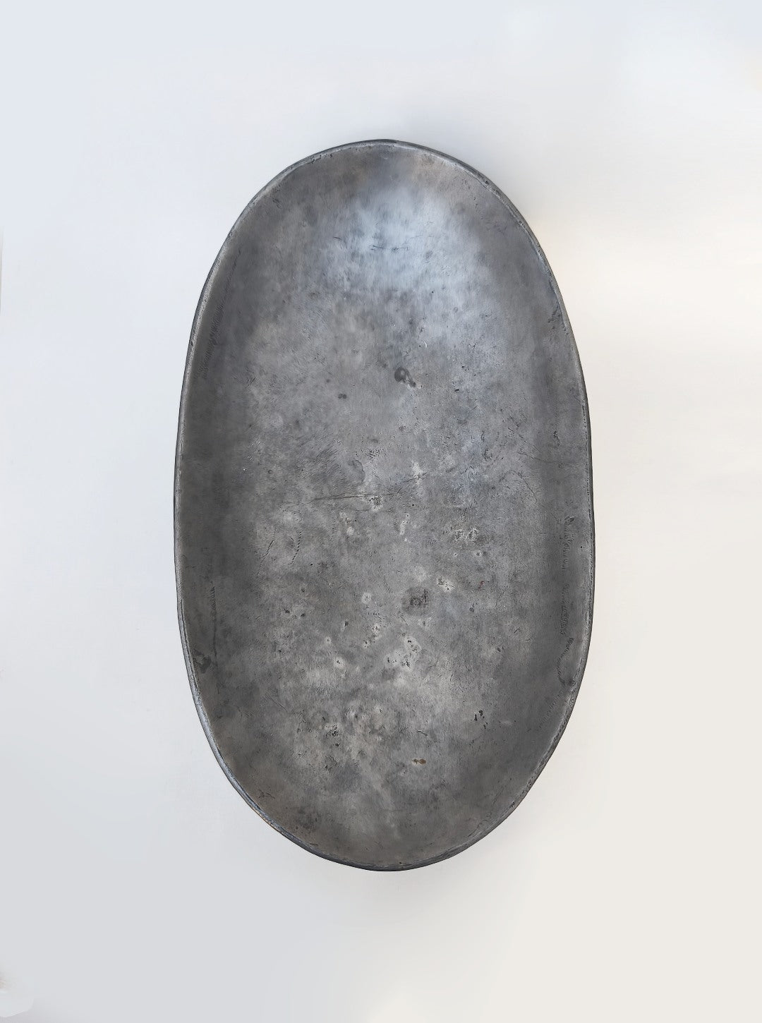 Large Pewter Fruit Cup — back view of smooth metallic surface