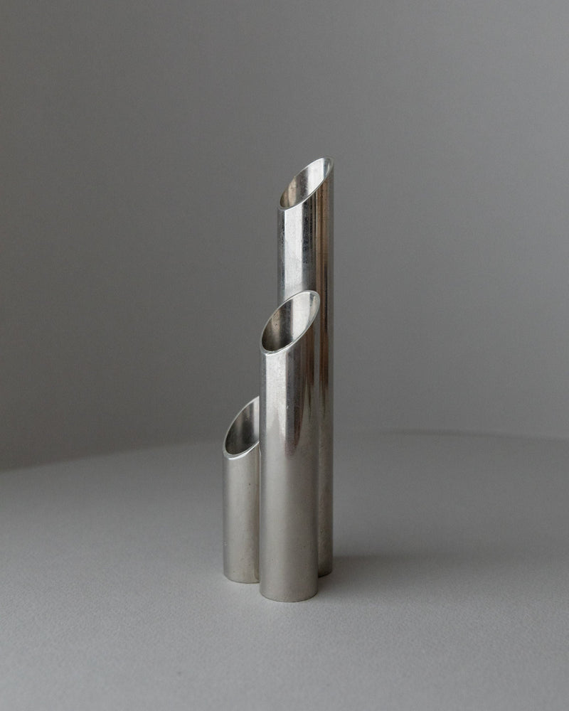 Stainless Steel Candle Holder, Italy 1970s — close-up of three cylindrical holders