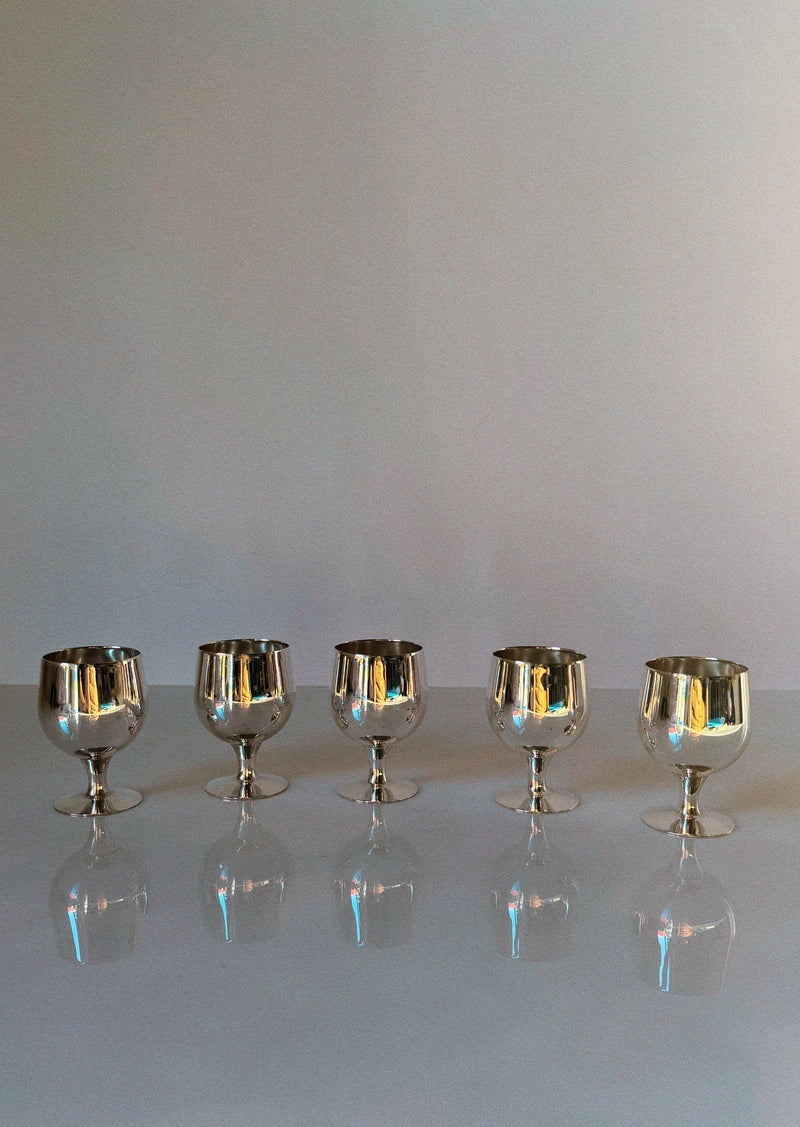 Set of 5 Silver Plated Liquor Cups, 70's Poland — close-up of reflective silver surface