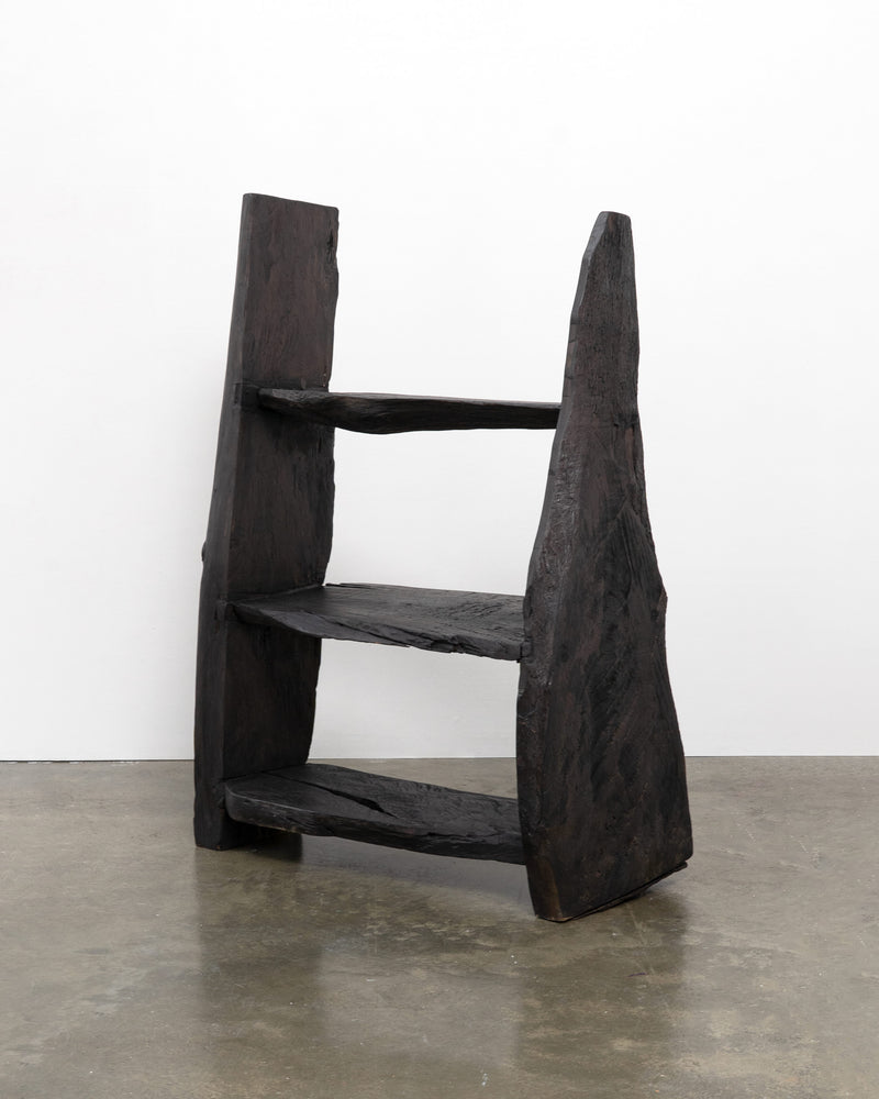 Dark charcoal brutalist wooden bookcase with three shelves