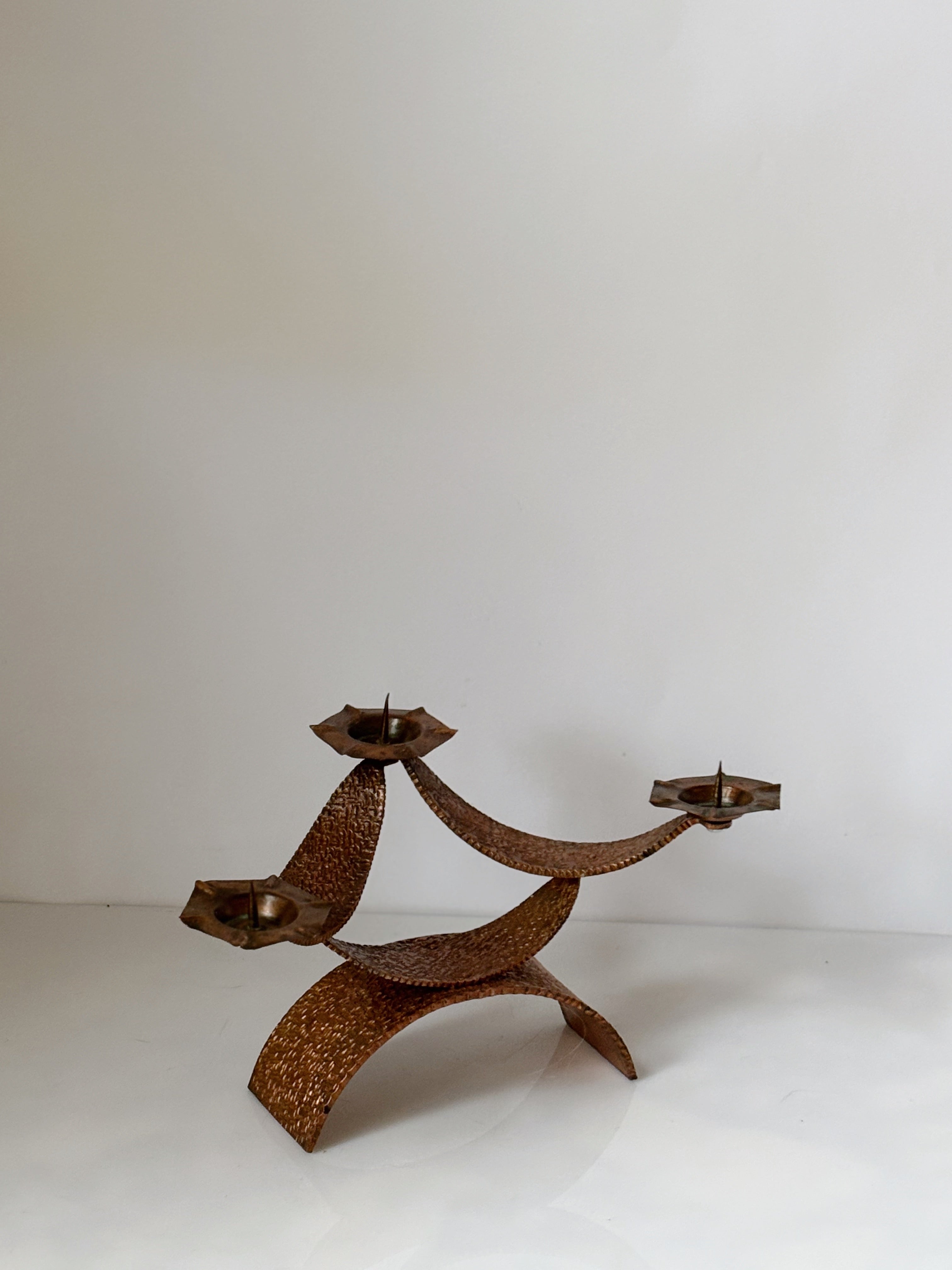 Mid Century Hammered Metal Candlestick, Poland — top view highlighting textured metal design