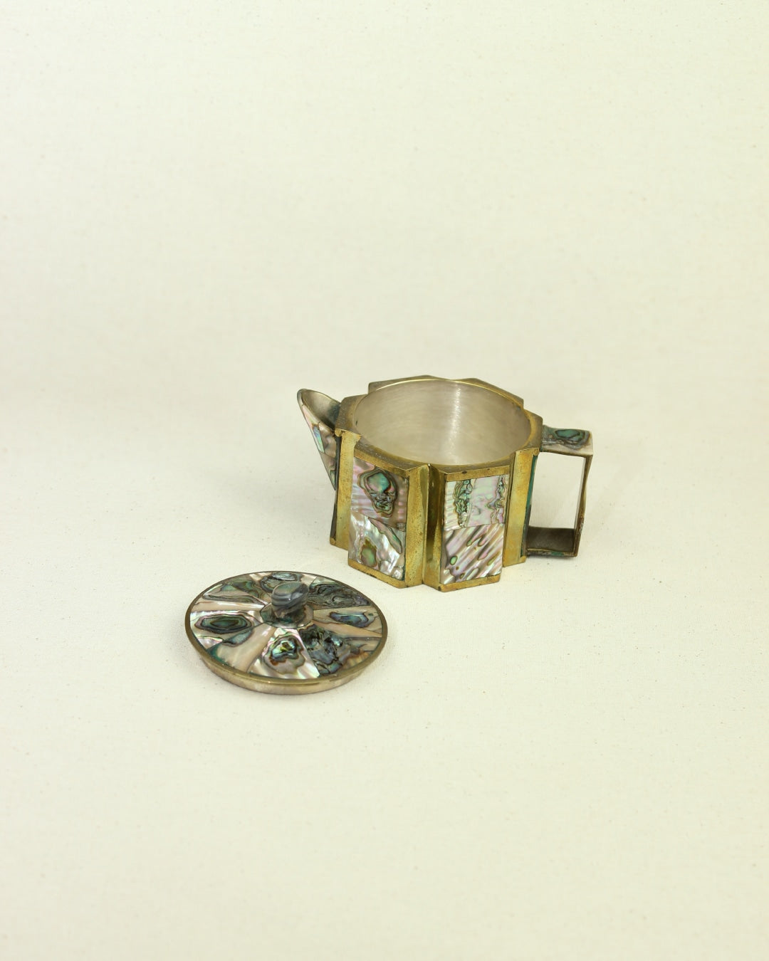 Vintage Abalone Jar — angled view with brass and abalone details
