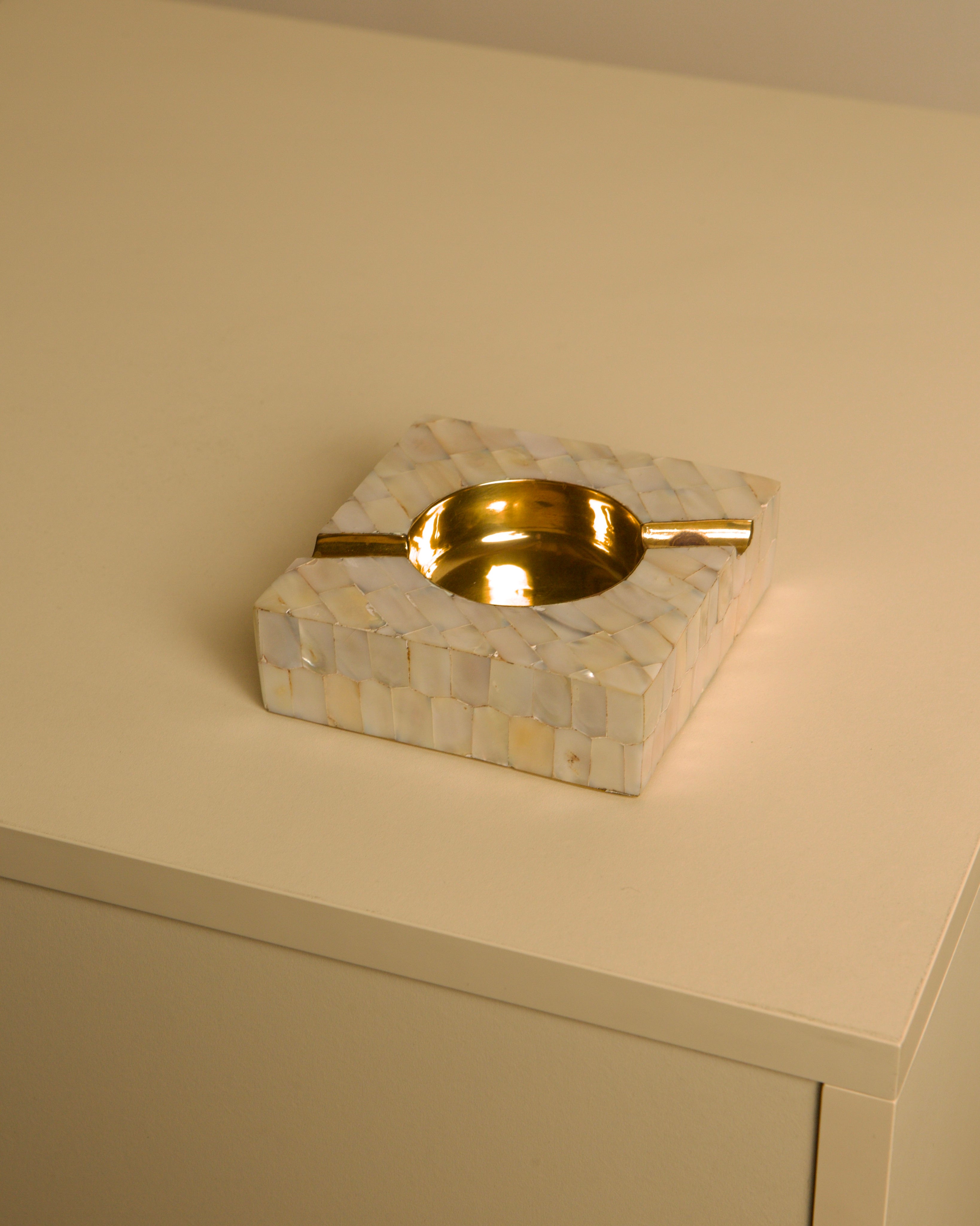 Art Deco Ashtray in Mother-of-pearl and Brass, 1930s — close-up of mother-of-pearl surface on light console