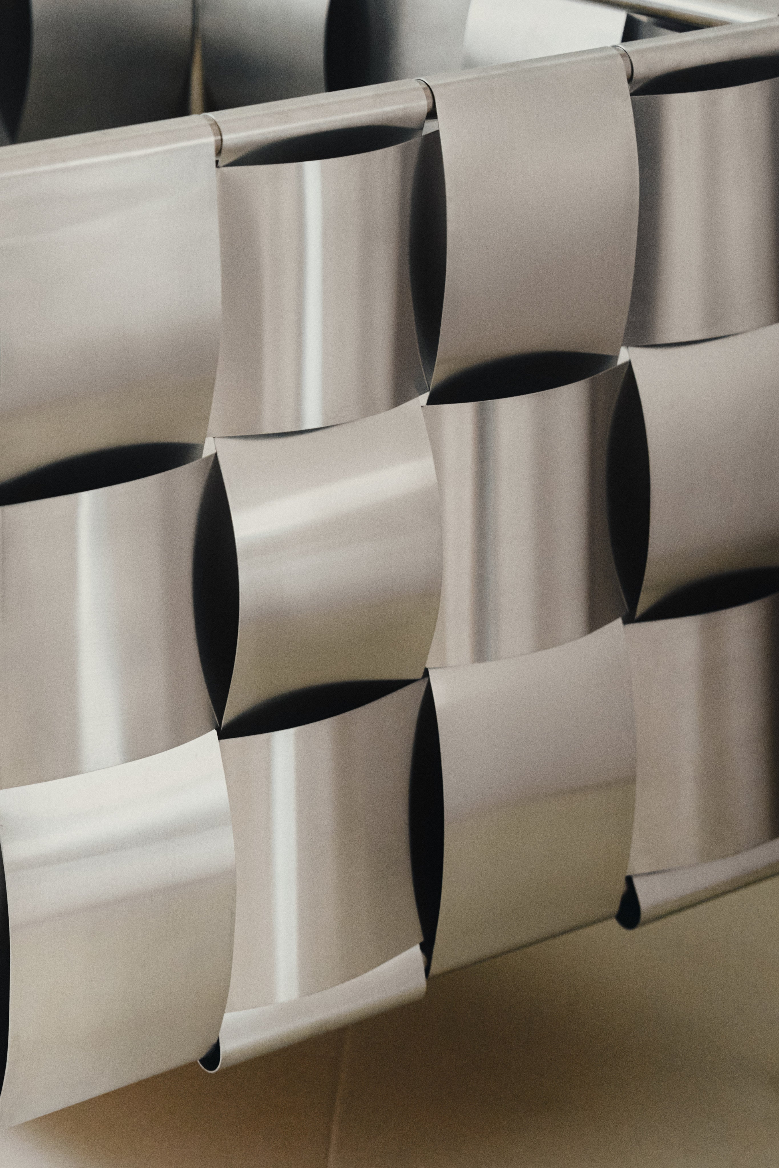 Braid Armchair — close-up of woven metallic seat detail