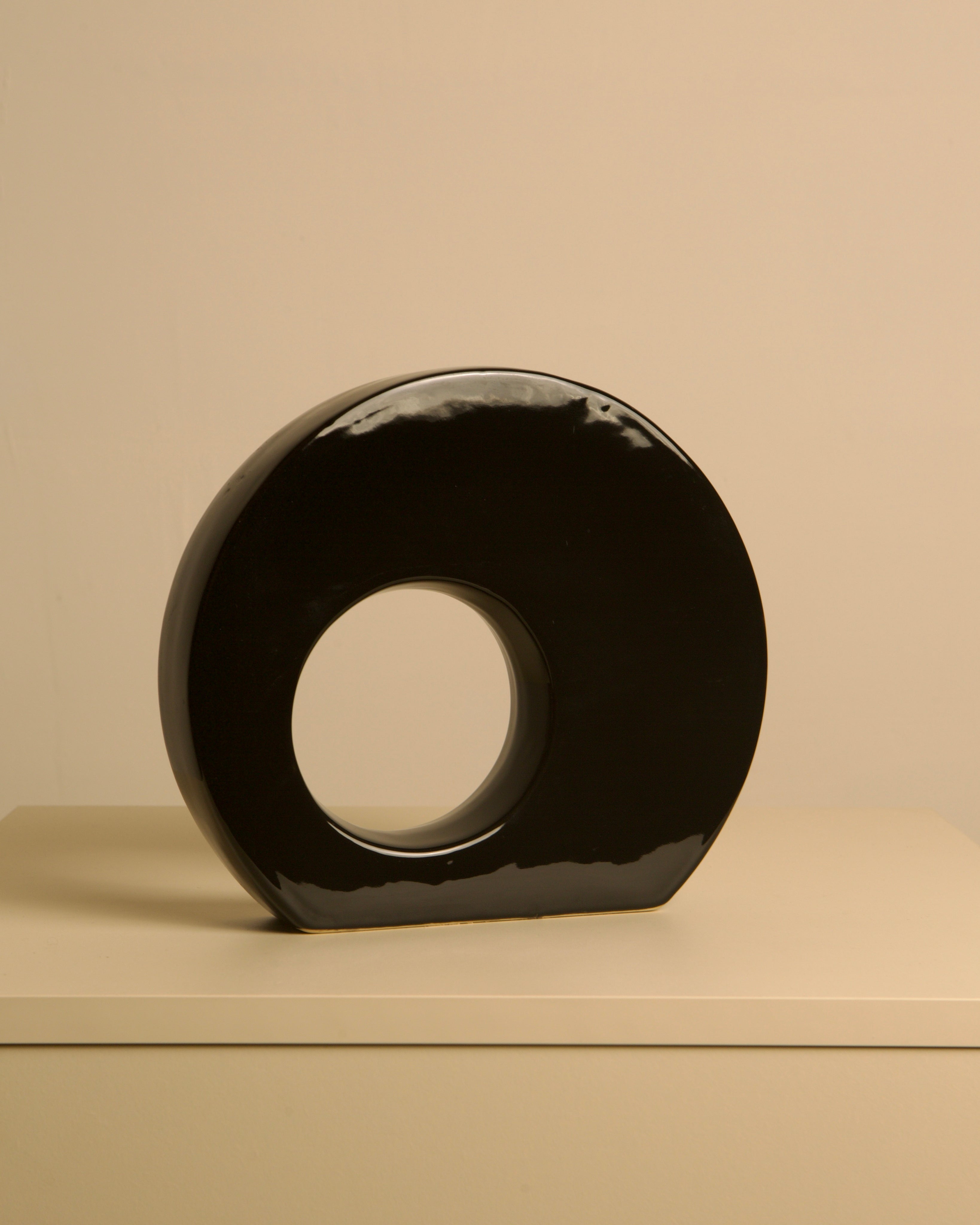Pair of black ceramic vase by Sicart 80's — side view on neutral background