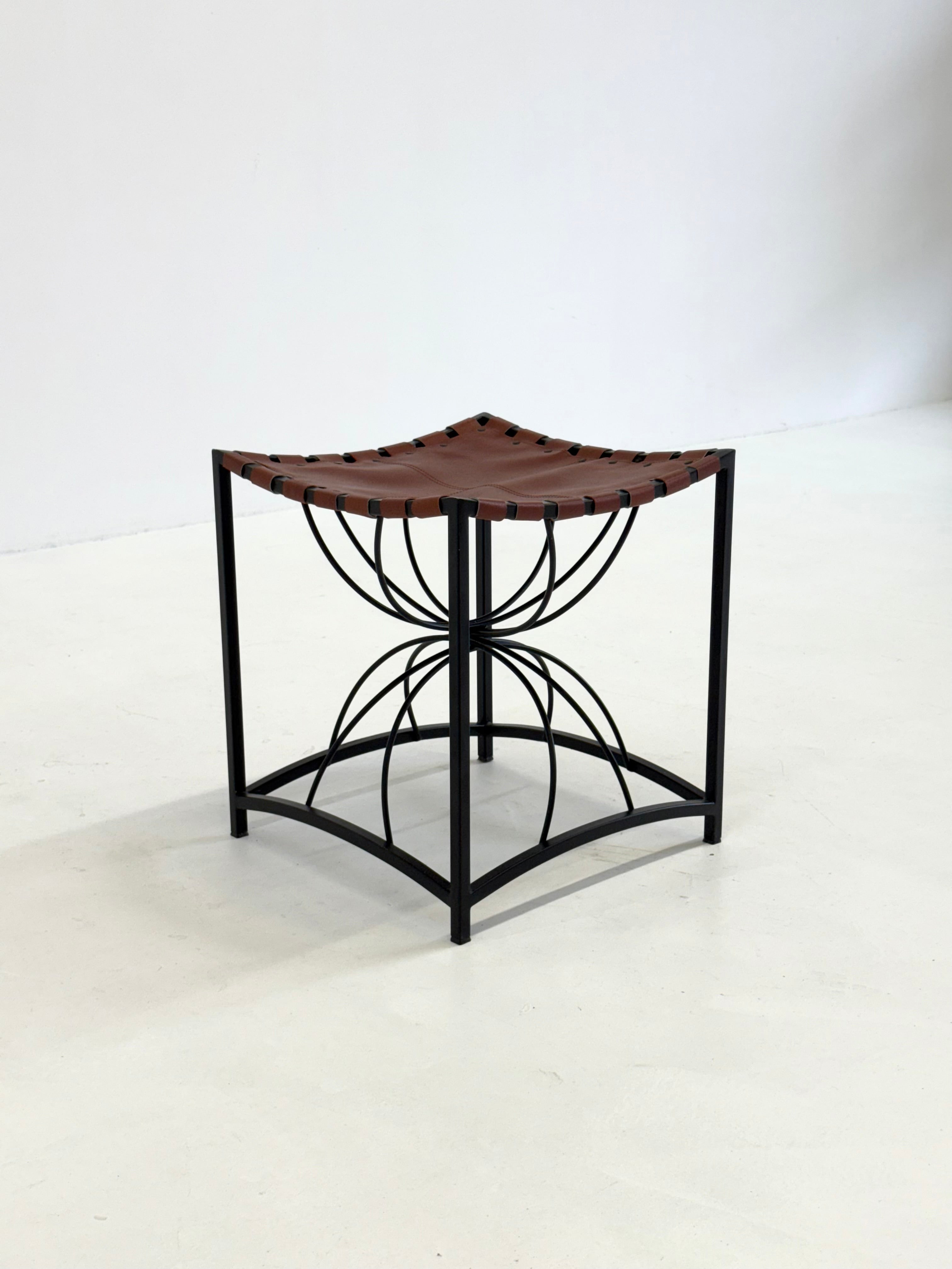 Elegant vintage French stool with black metal and brown leather — alternate view
